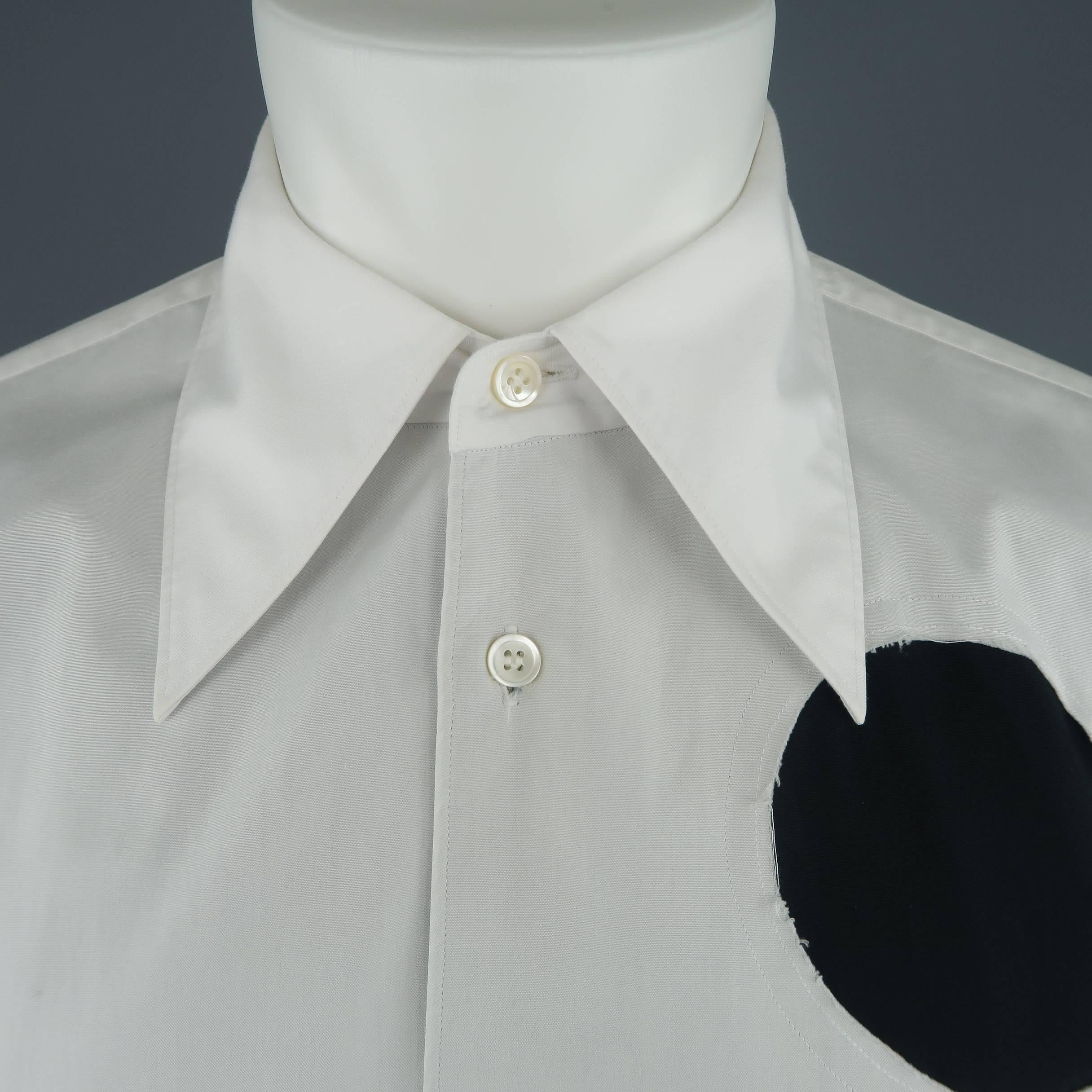 COMME des GARCONS HOMME PLUS shirt comes in white cotton with an oversized, pointed collar and three frayed circle cutouts patched with black fabric. Made in Japan.
 
Excellent Pre-Owned Condition.
Marked: M
 
Measurements:
 
Shoulder: 18 in.
Chest: