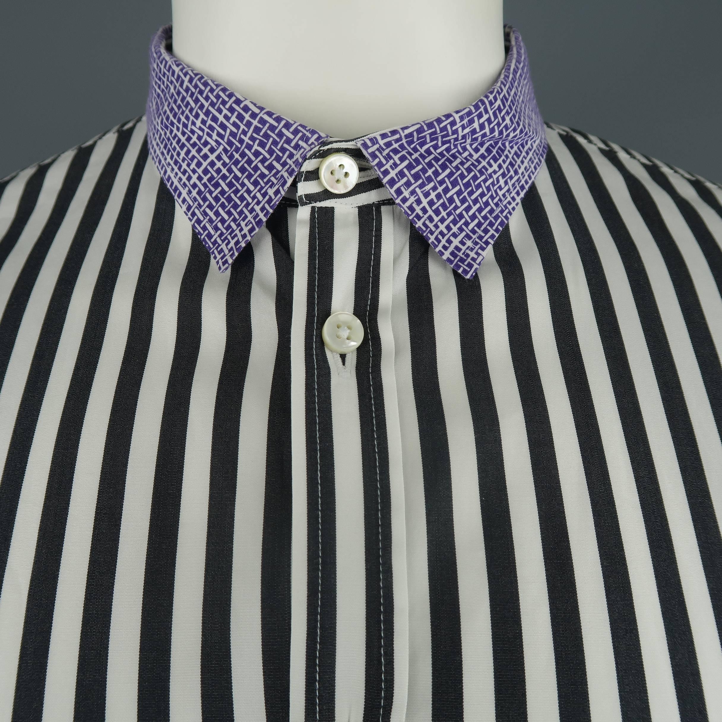 BOTTEGA VENETA shirt comes in black and white striped cotton with purple woven print contrast collar and cuffs. Made in Italy.
 
Excellent Pre-Owned Condition.
Marked: IT 52
 
Measurements:
 
Shoulder: 18 in.
Chest: 46 in.
Sleeve: 27.5 in.
Length: