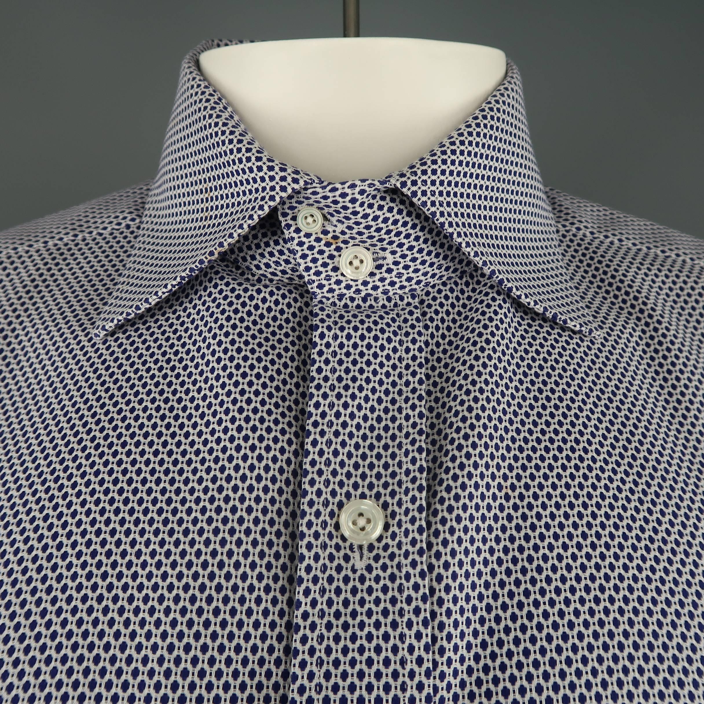 TOM FORD dress shirt comes in a navy and white pattern cotton with two button  spread collar. Small spot on collar. As-is. Made in Italy.
 
Fair Pre-Owned Condition.
Marked: 43  17
 
Measurements:
 
Shoulder: 19 in.
Chest: 46 in.
Sleeve: 26