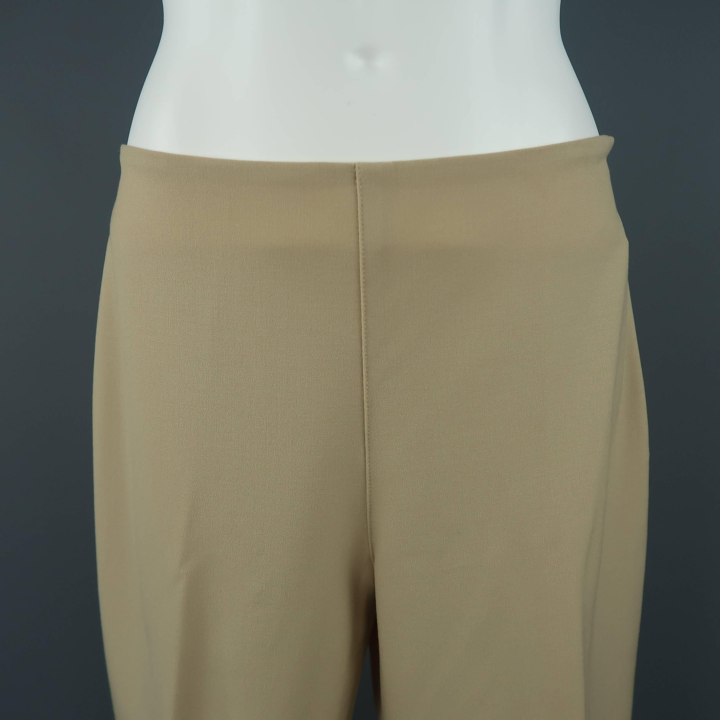 RALPH LAUREN BLACK LABEL dress pants come in a tan khaki stretch wool with a high rise and skinny fitted silhouette.
 
Good Pre-Owned Condition.
Marked: 6
 
Measurements:
 
Waist: 29 in.
Rise: 9.5 in.
Inseam:  27 in.
