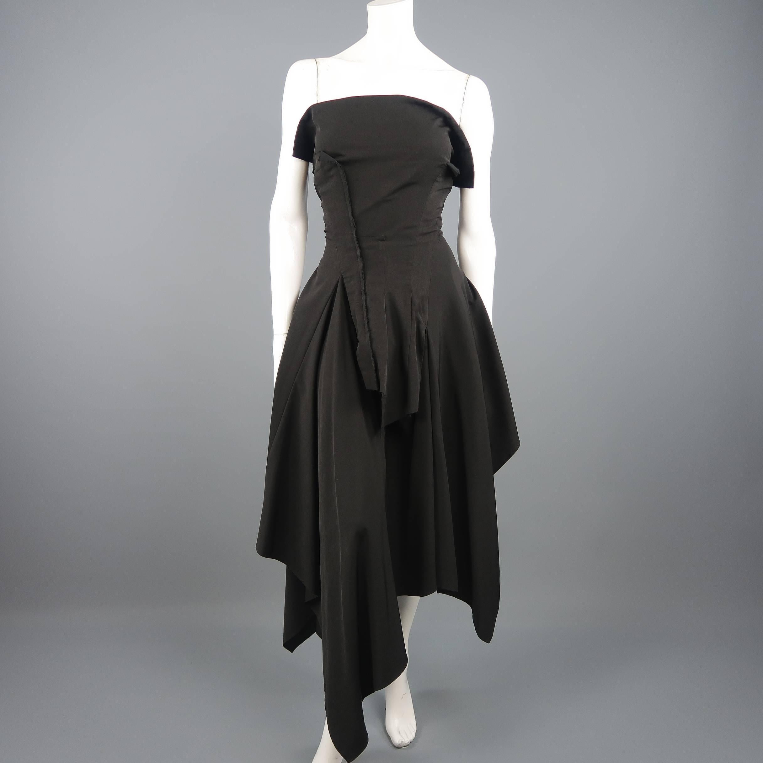 YOHJI YAMAMOTO dress features a deconstructed patchwork boned bustier bodice with high flap front, laced back details, and asymmetrical layered ruffle skirt. Made in Japan.
 
Excellent Pre-Owned Condition.
Marked: JP 3
 
Measurements:
 
Bust: 34