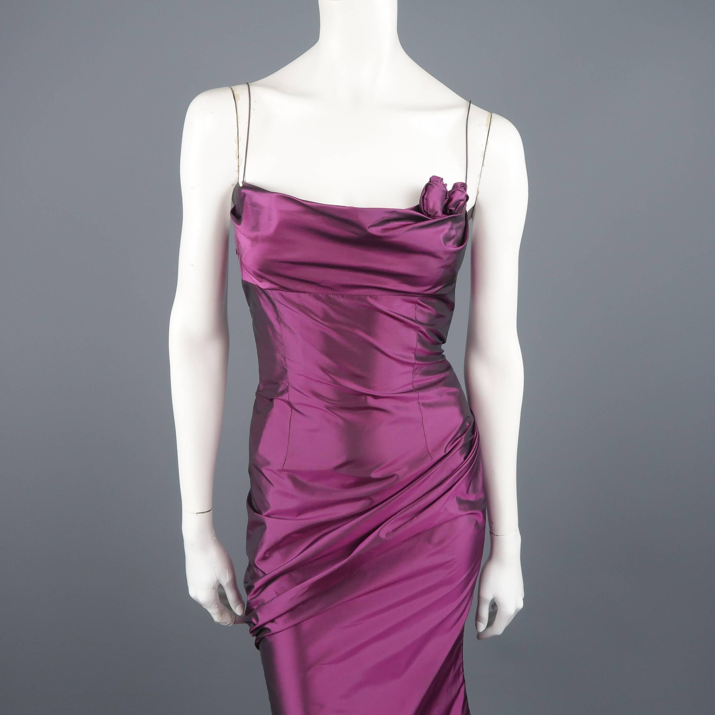 Vintage RICHARD TYLER COUTURE evening gown comes in fuchsia purple iridescent silk taffeta and features a gathered bustline, fitted body with draped side, spaghetti straps, and rosette applique details. Minor wear and marks under arms. Made in the