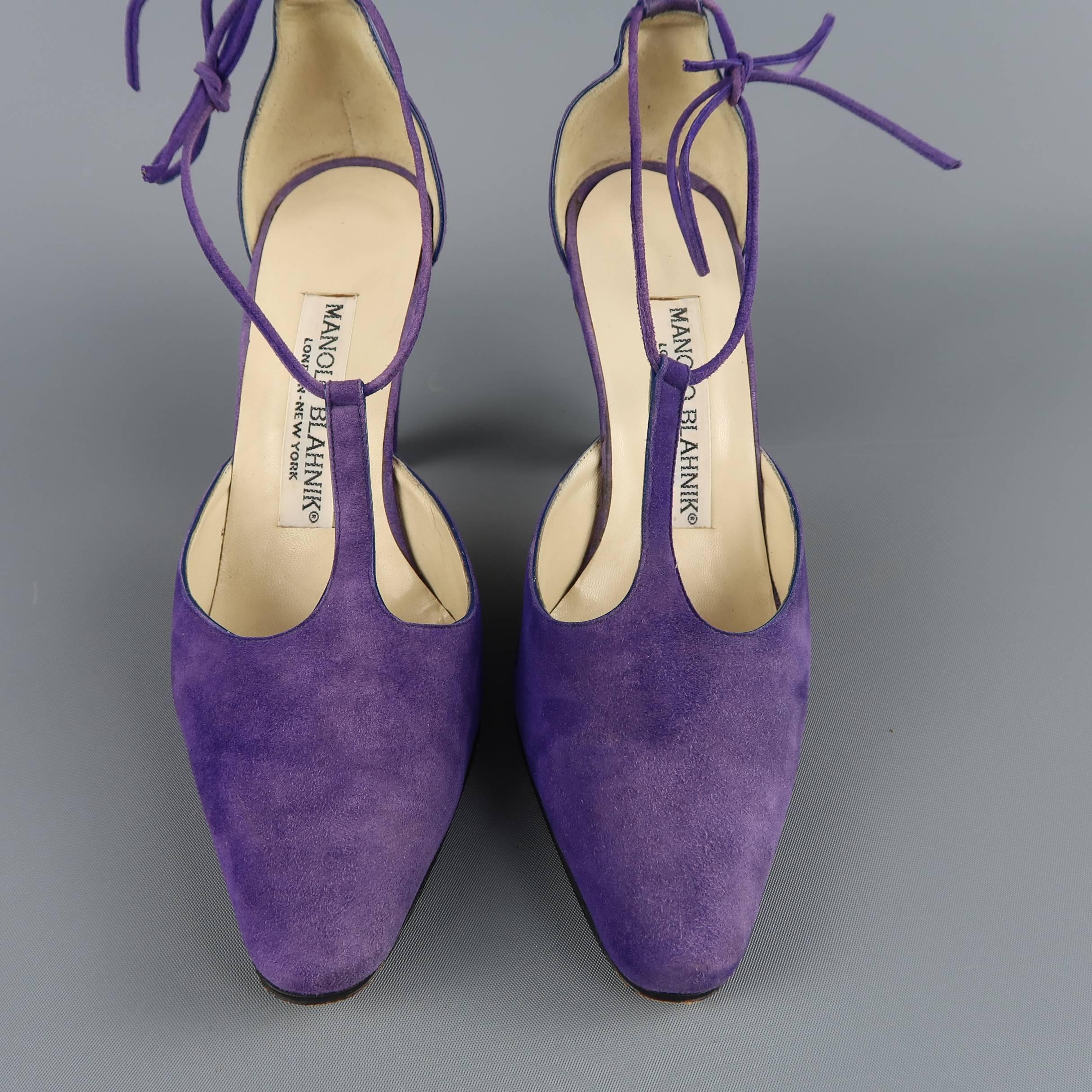 Vintage MANOLO BLAHNIK pumps come in purple suede with a pointed toe, T strap covered heel, and tied ankle. Wear throughout. Made in Italy.
 
Fair Pre-Owned Condition.
Marked: IT 36
 
Measurements:
 
Heel: 3.25 in.
