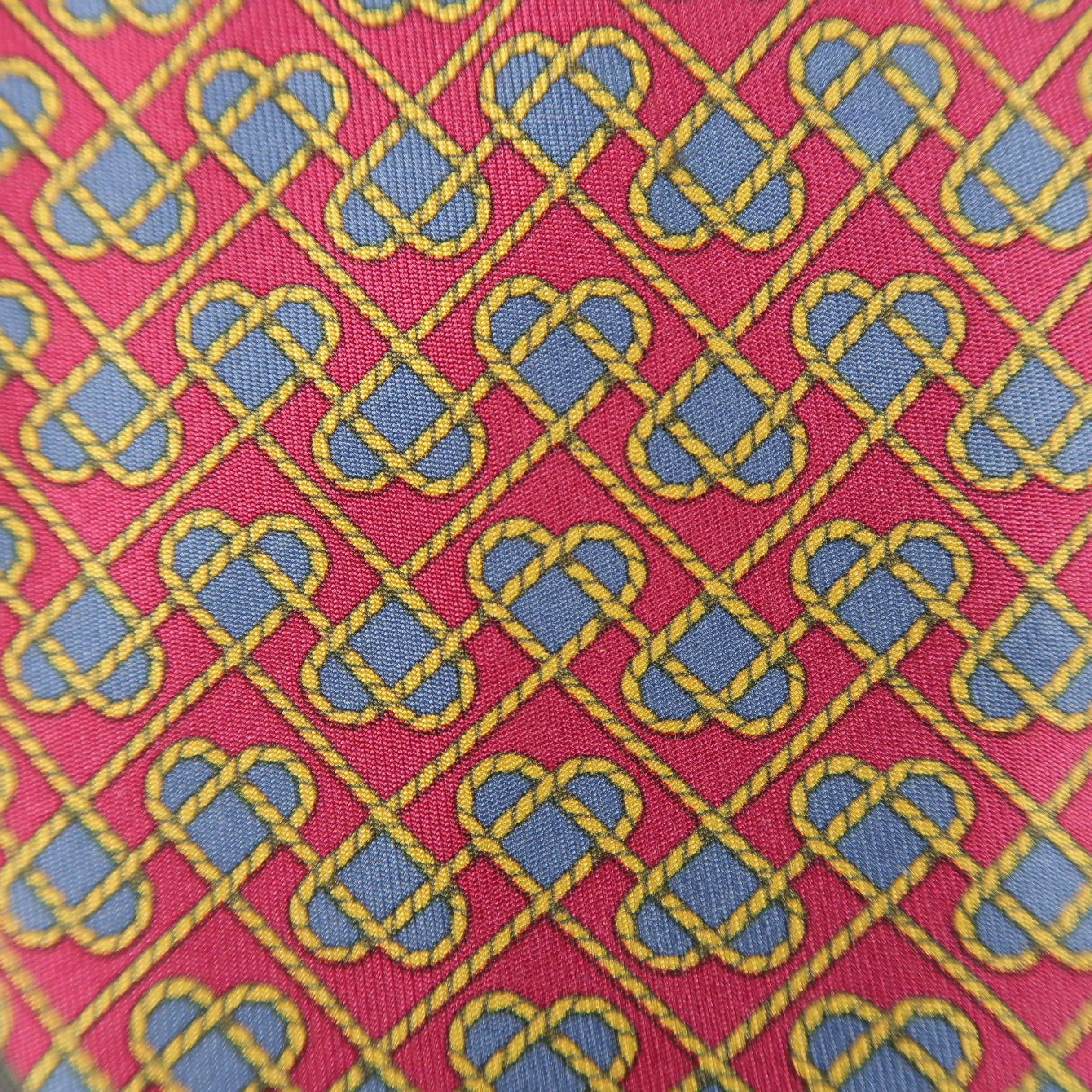 Vintage HERMES necktie comes in muted raspberry red silk twill with all over gold rope blue hearts print. Made in France.
 
Excellent Pre-Owned Condition.
 
Width: 3.25 in.
