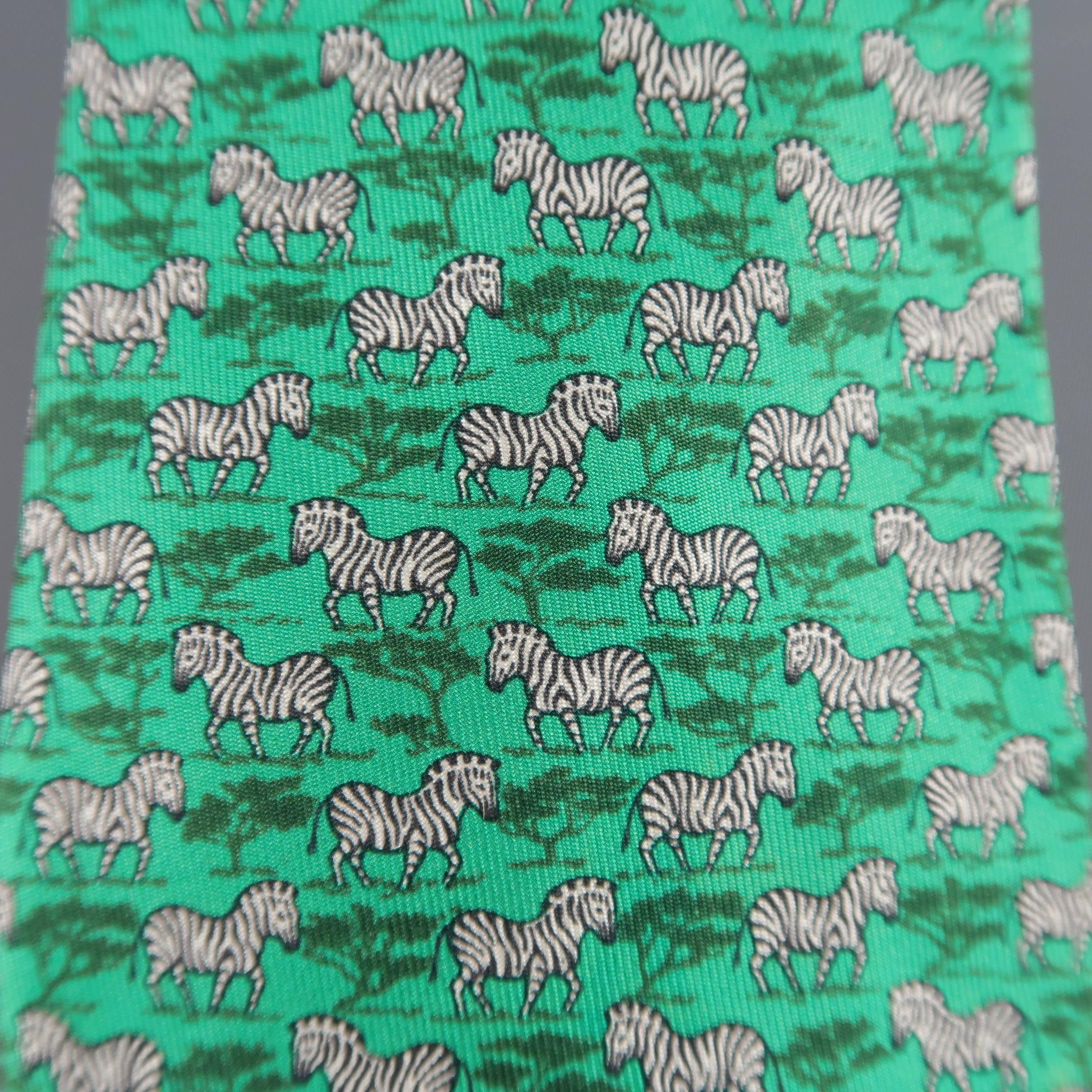 Vintage HERMES necktie comes in emerald green silk twill with all over zebra print. Wear and discolorations. As-is. Made in France.
 
Fair Pre-Owned Condition.
 
Width: 3.25 in.
