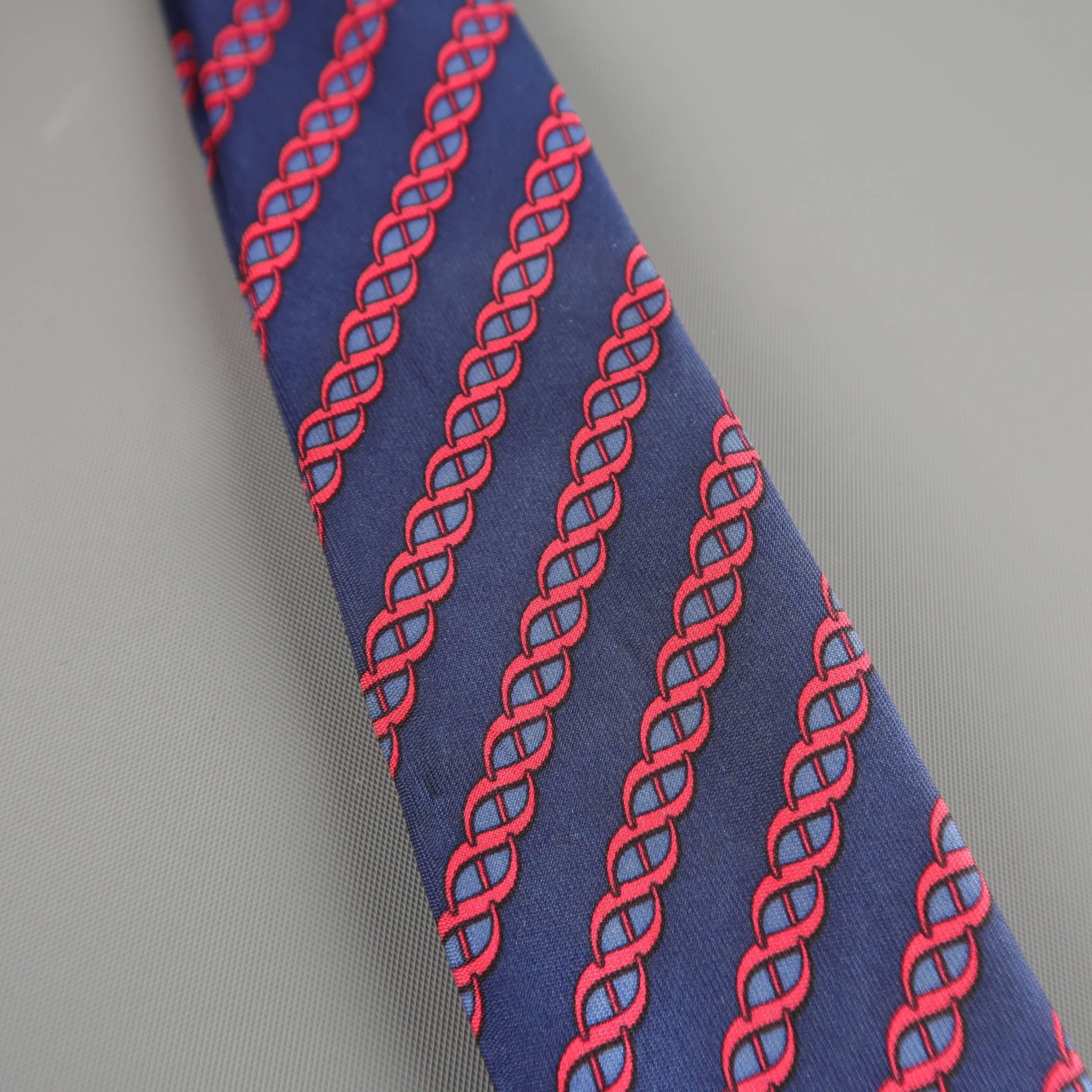 Vintage HERMES necktie comes in navy blue silk twill with all over red and blue diagonal twist stripe pattern print. Made in France.
 
Good Pre-Owned Condition.
 
Width: 3.25 in.
