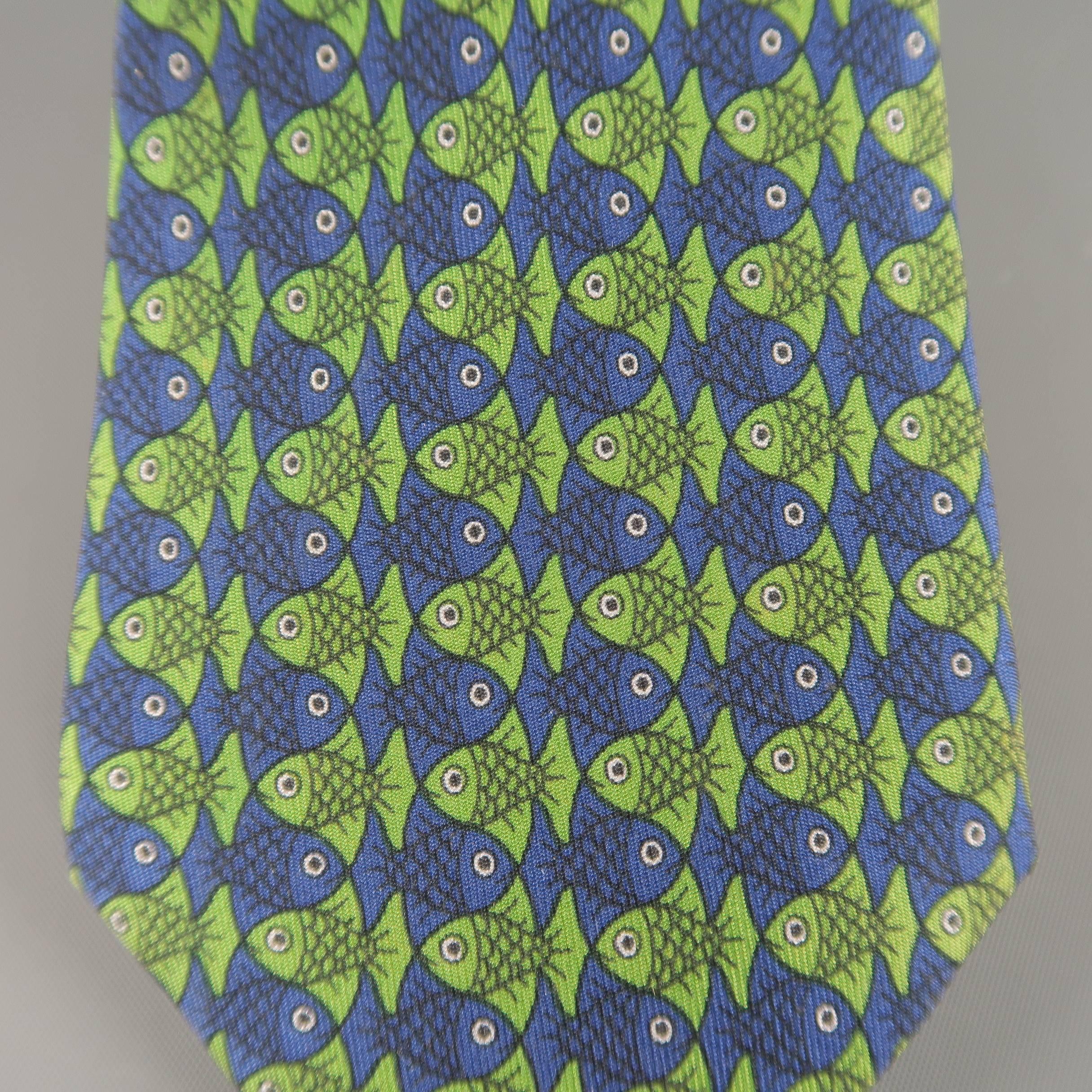 Vintage HERMES necktie comes in silk twill with all over navy blue and green fish print. Made in France.
 
Excellent Pre-Owned Condition.
 
Width: 3 in.
