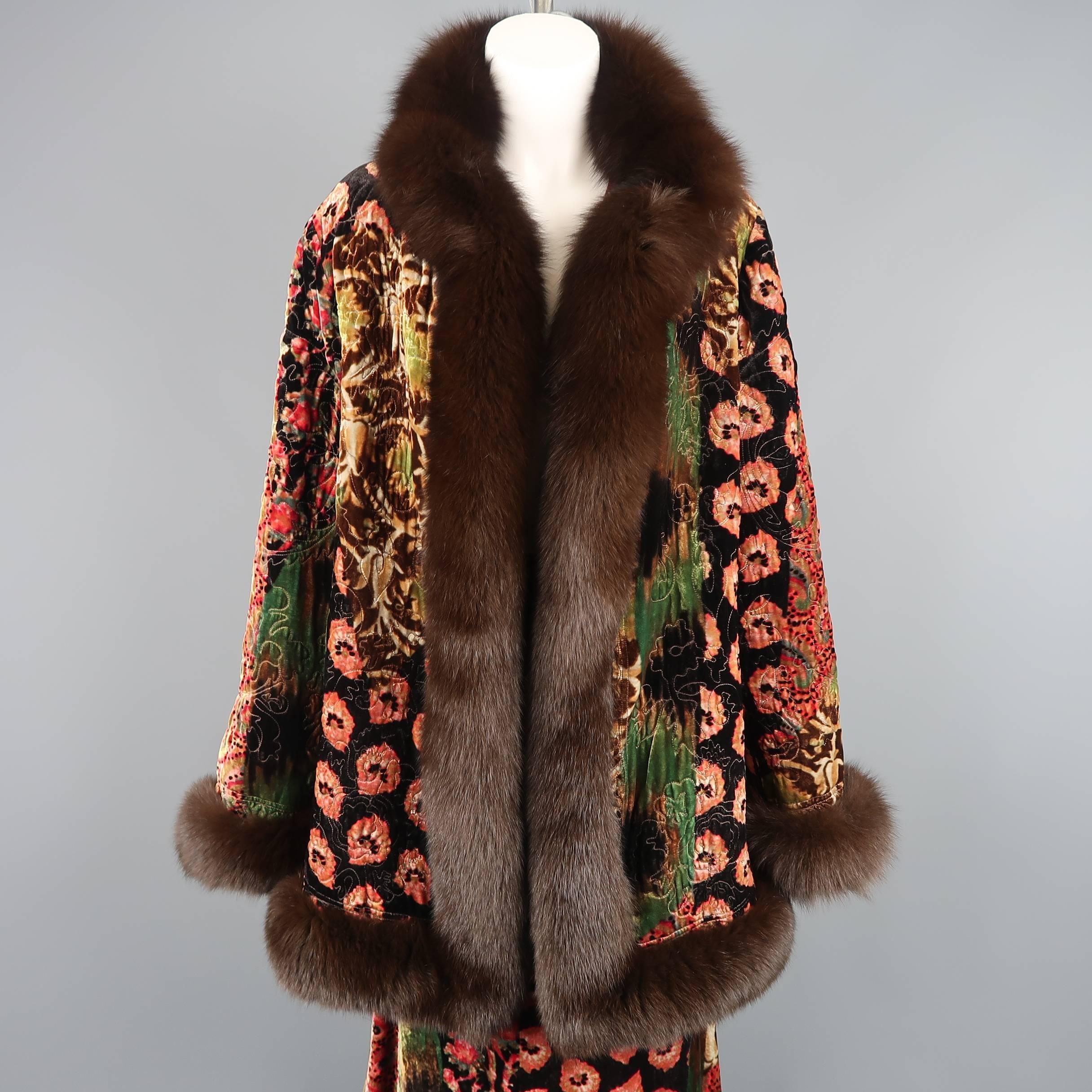 Vintage OSCAR DE LA RENTA evening ensemble comes in a mixed paisley floral print silk blend velvet and includes a quilted open coat with brown fox fur trim and matching A ling skirt with fur trimmed hem. Made in USA.
 
Excellent Pre-Owned