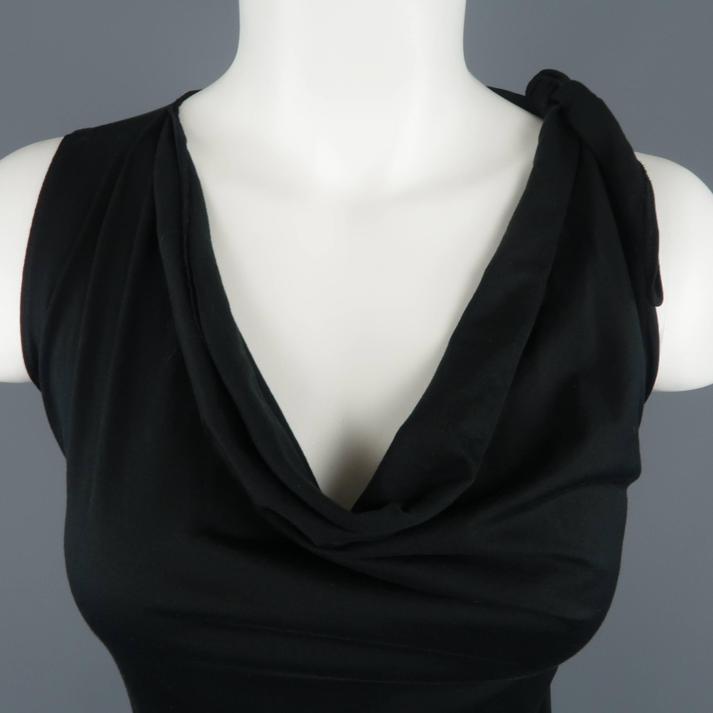 YVES SAINT LAURENT by TOM FORD top comes in black cotton jersey with a tied shoulder and draped scoop neck. Made in Italy.
 
Excellent Pre-Owned Condition.
Marked: L
 
Measurements:
 
Bust: 40 in.
Length: 23 in.
