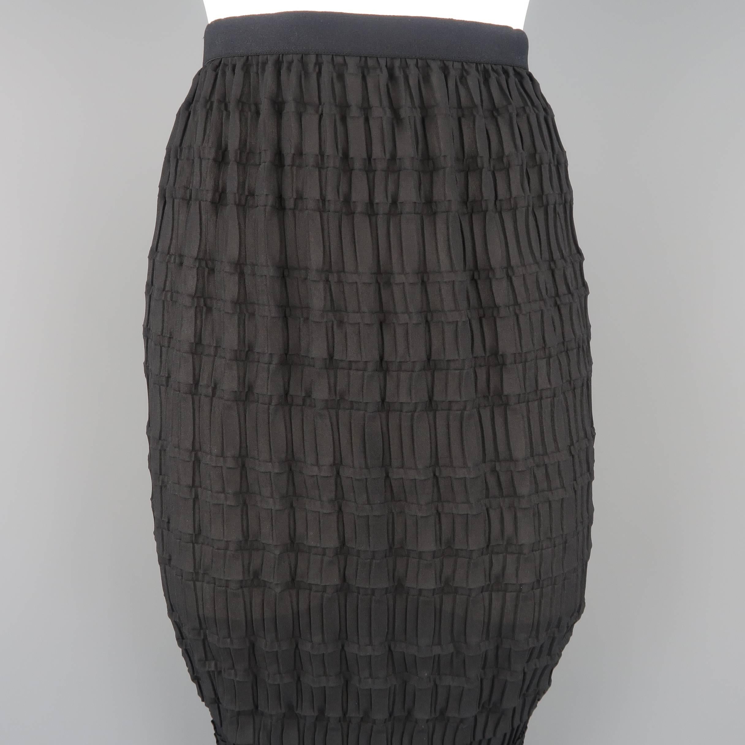 YOHJI YAMAMOTO NOIR pencil skirt comes in sheer chiffon with all over pleated pattern, elastic waistband, and gathered back. Minor wear. Made in Japan.
 
Good Pre-Owned Condition.
Marked: JP 4
 
Measurements:
 
Waist: 25 in.
Hip: 38 in.
Length: 35