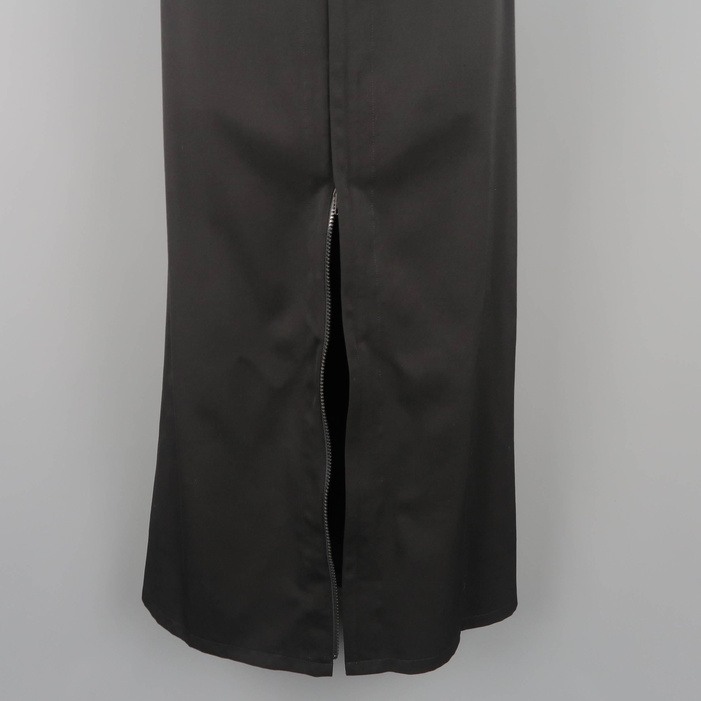 YOHJI YAMAMOTO skirt comes in light weight wool twill with a high rise, long A line silhouette, and double zip front.  Made in Japan.
 
Excellent Pre-Owned Condition.
Marked: JP 1
 
Measurements:
 
Waist: 27 in.
Hip: 38 in.
Length: 37 in.
