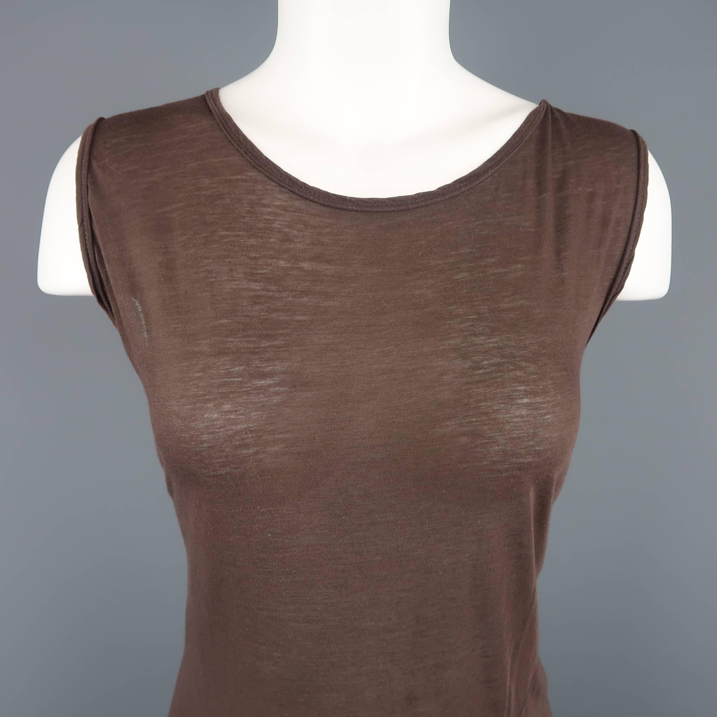 DRKSHDW by RICK OWENS tanks comes in taupe brown silk blend burnout jersey with diagonal seams and a scoop neck. Made in Italy.
 
Good Pre-Owned Condition.
Marked: (no size)
 
Measurements:
 
Shoulder: 16 in.
Bust: 38 in.
Length: 31 in.
