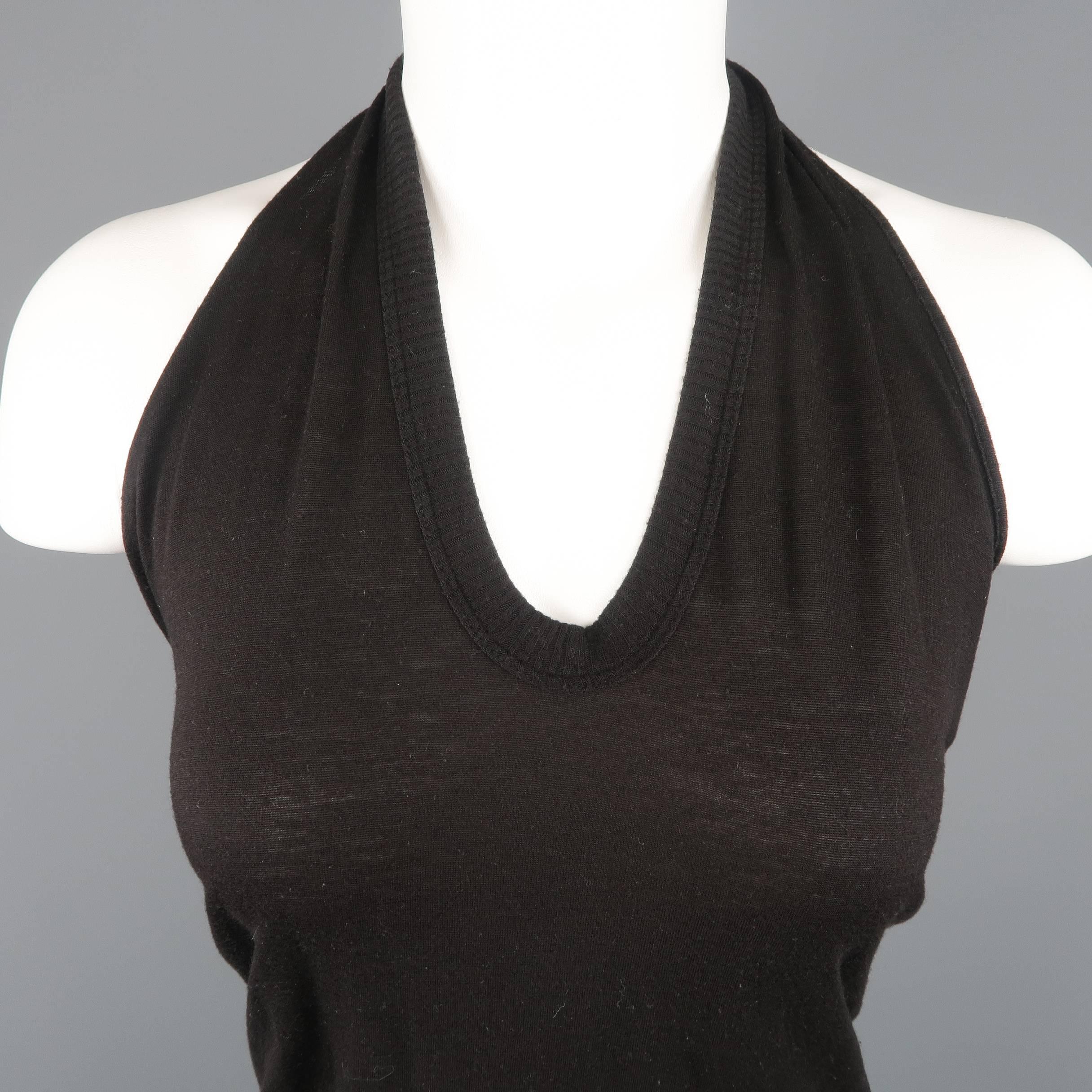 RICK OWENS top comes in black silk viscose blend jersey with a ribbed halter top. Made in Italy.
 
Good Pre-Owned Condition.
Marked: US 6
 
Measurements:
 
Bust: 38 in.
Length: 30 in.
