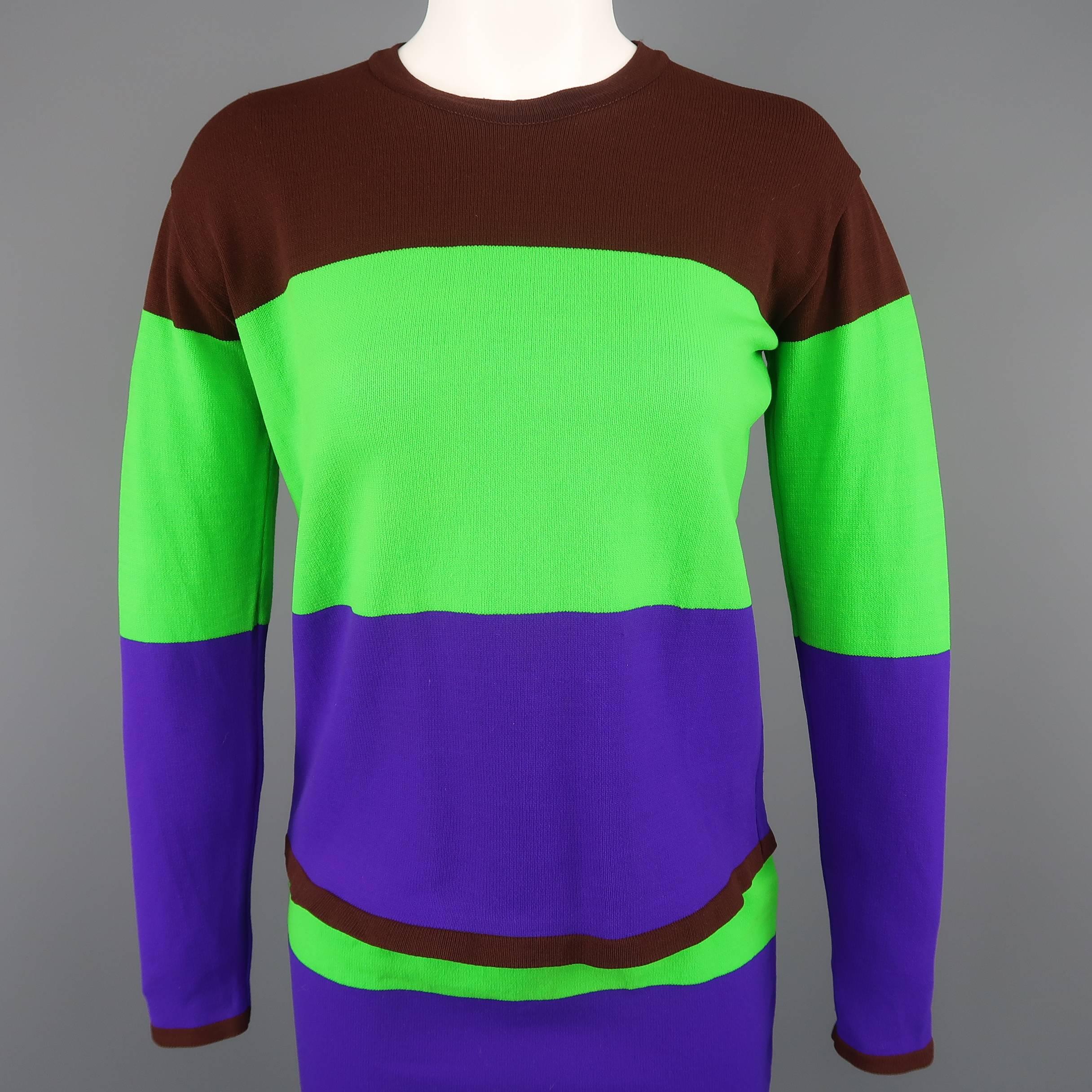 Vintage ISSEY MIYAKE sweater set ensemble comes in bright green, brown, and purple color block stripe stretch knit and includes a crewneck pullover and matching mini skirt. Made in Japan.
 
Excellent Pre-Owned Condition.
Marked: Top: M / Skirt: S
