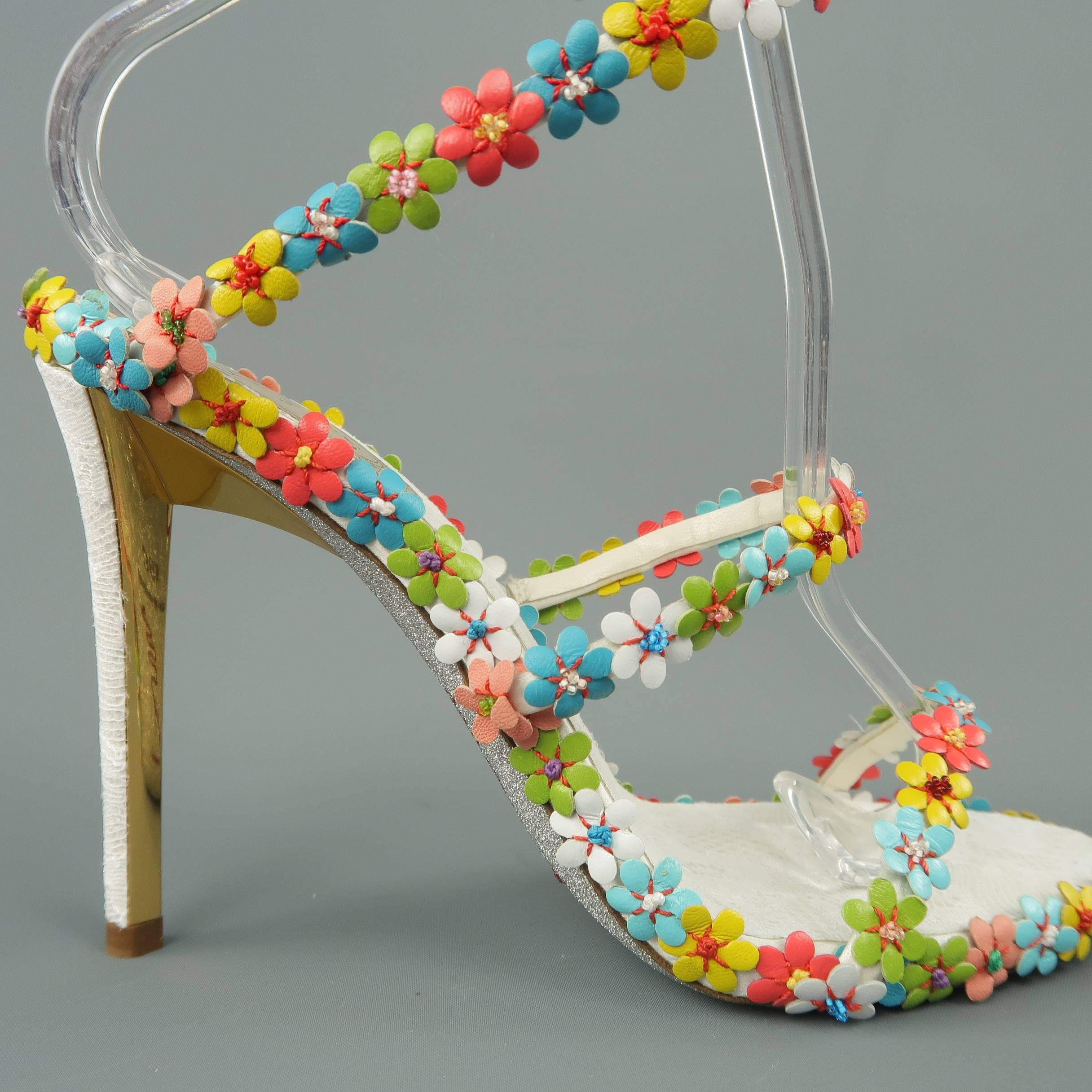 Rene Caovilla sandals come in white leather with a lace insole, multi-color leather beaded flower applique straps, coil wrapped ankle strap, glitter sole, and lace applique heel with gold tone metal detail.  Made in Italy.
 
Brand New.
Marked: IT