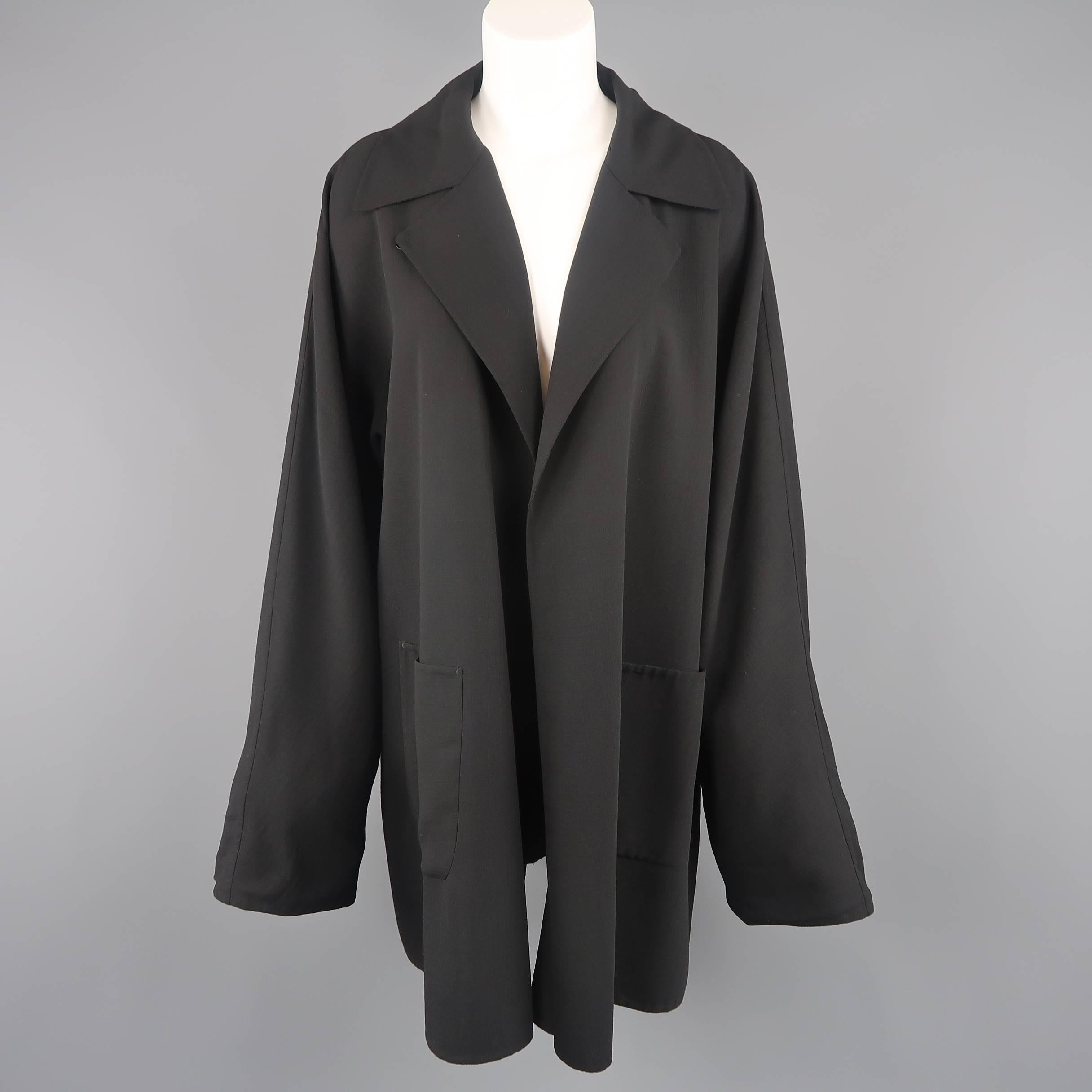 Vintage Jil Sander coat comes in light weight fabric with a pointed collar, patch pockets, and button over closure. Tags cut out. As-is.
 
Good Pre-Owned Condition.
Marked: (no size)
 
Measurements:
 
Shoulder: 21 in.
Bust: 50 in.
Sleeve: 28