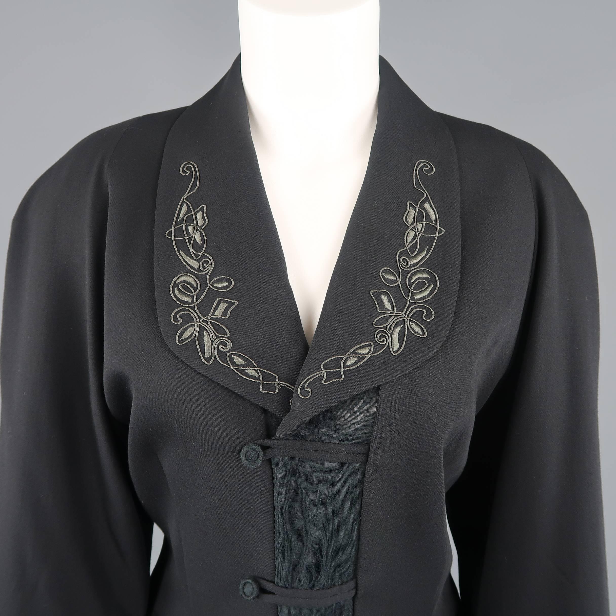 Vintage Matsuda jacket comes in black wool with padded shoulder, embroidered shawl collar, double breasted closure, and moire print burnout jersey peplum panel. Made in Japan.
 
Good Pre-Owned Condition.
Marked: (no size)
 
Measurements:
 
Shoulder: