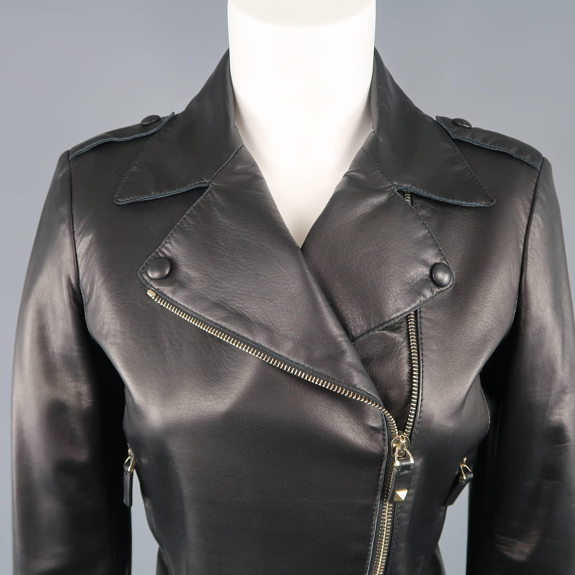 Valentino cropped biker jacket comes in smooth black leather with a pointed lapel, asymmetrical double zip front, zip pockets, and epaulets. Made in Italy.
 
Good Pre-Owned Condition.
Marked: 4

Measurements:
 
Shoulder: 15 in.
Bust: 35 in.
Sleeve: