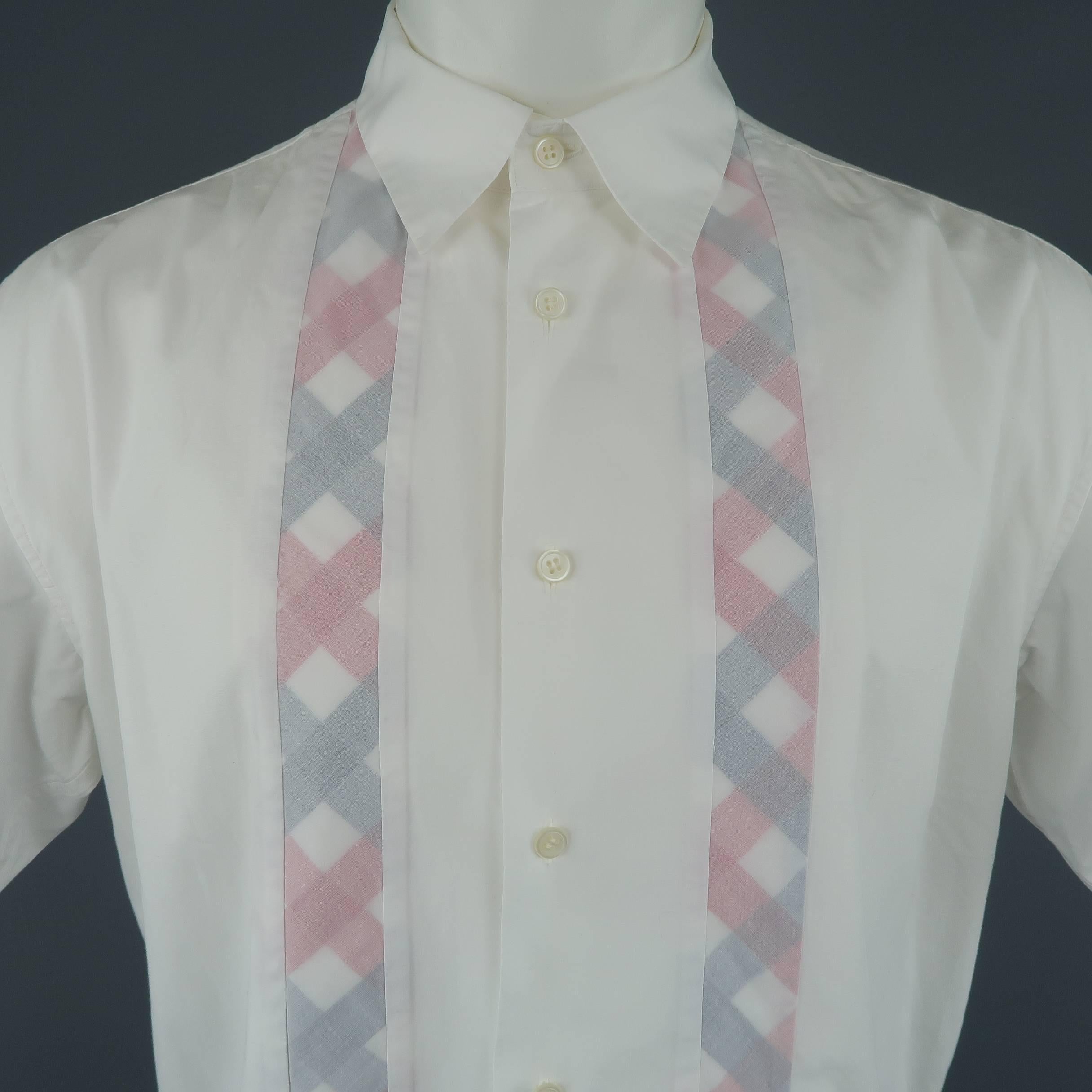 Issey Miyake short sleeve shirt comes in light weight white cotton with a pointed collar and reverse navy and red plaid stripe panels. Mark on front. As-is. Made in Japan.
 
Fair Pre-Owned Condition.
Marked: (no size)
 
Measurements:
 
Shoulder: 20