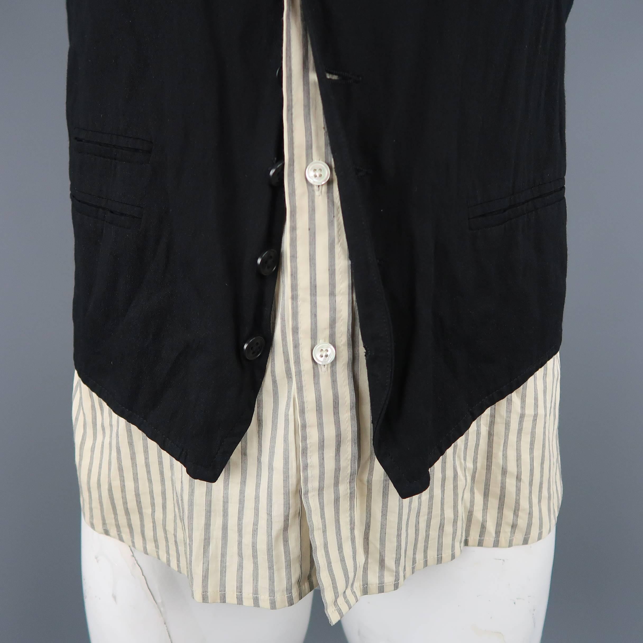 Ann Demeulemeester vest features a classic wrinkle textured black V neck vest with beige striped shirt under panel. Made in Tunisia.
 
Good Pre-Owned Condition.
Marked: L
 
Measurements:
 
Shoulder: 15.5 in.
Chest: 42 in.
Length: 28 in.
