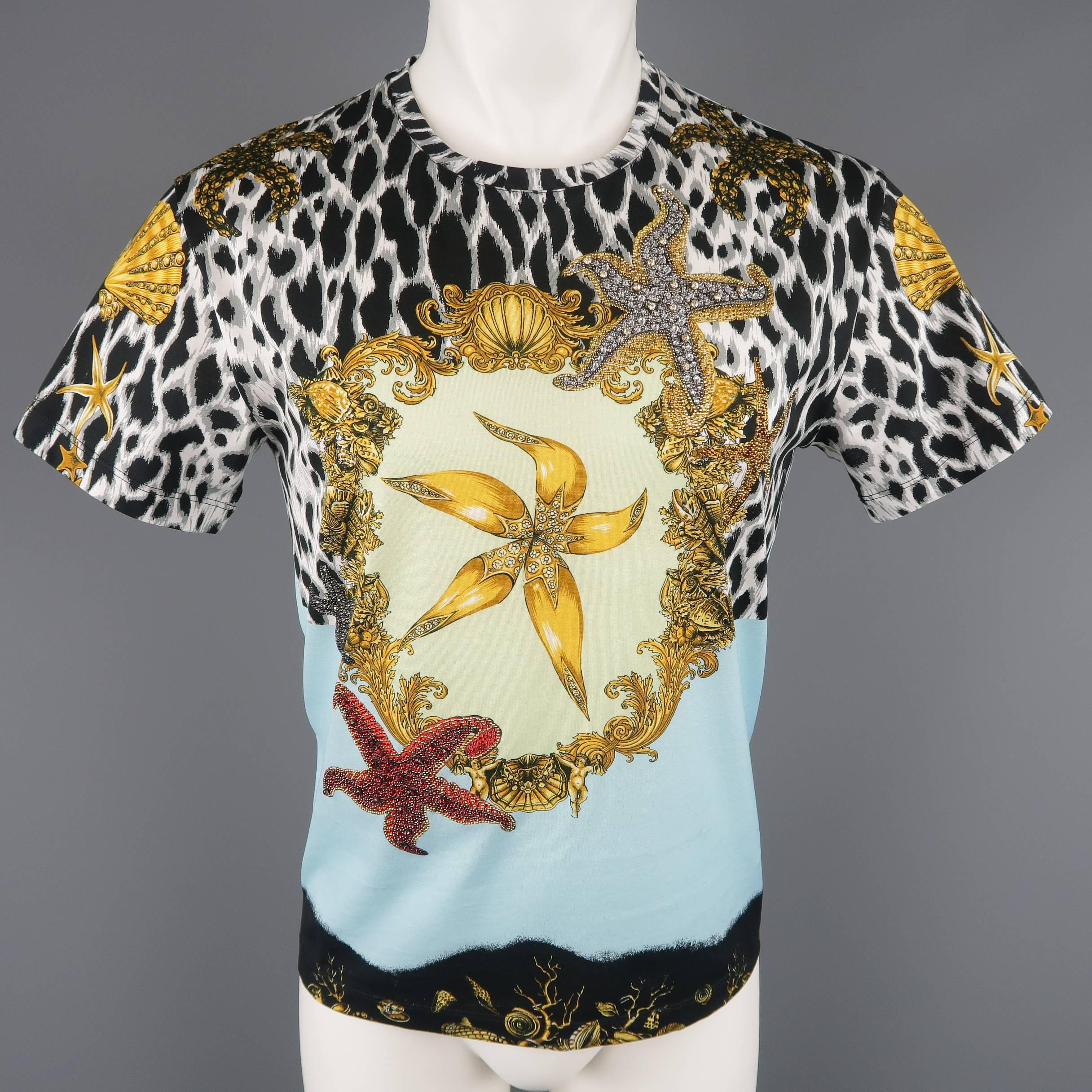 Limited Edition Versace Tribute line T-shirt comes in light blue and gray scale cheetah print cotton jersey with an original Gianni Versace circa Spring 1992 