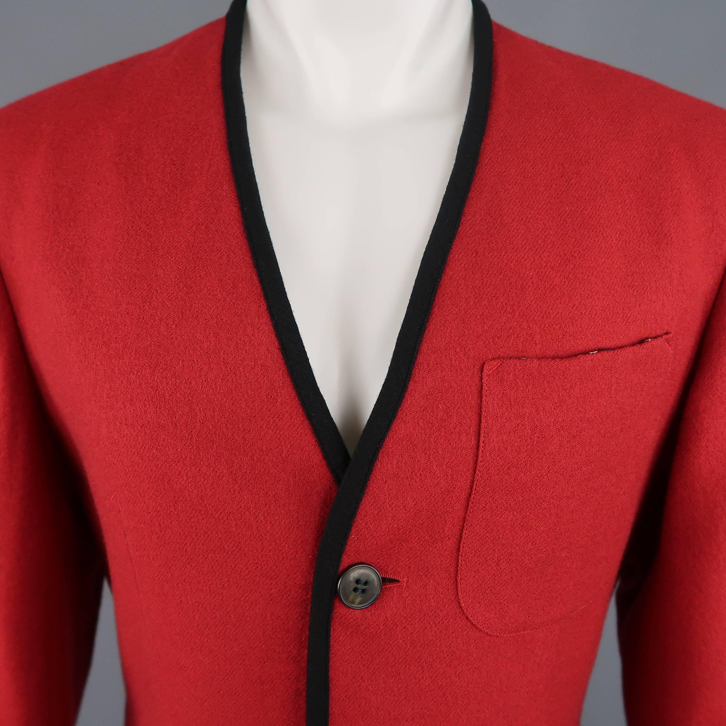 Vintage Jean Paul Gaultier Homme jacket comes in dark red wool with a collarless V neckline, black piping, patch pockets, back tab, and printed liner. Made in Italy.
 
Excellent Pre-Owned Condition.
Marked: IT 48
 
Measurements:
 
Shoulder: 18