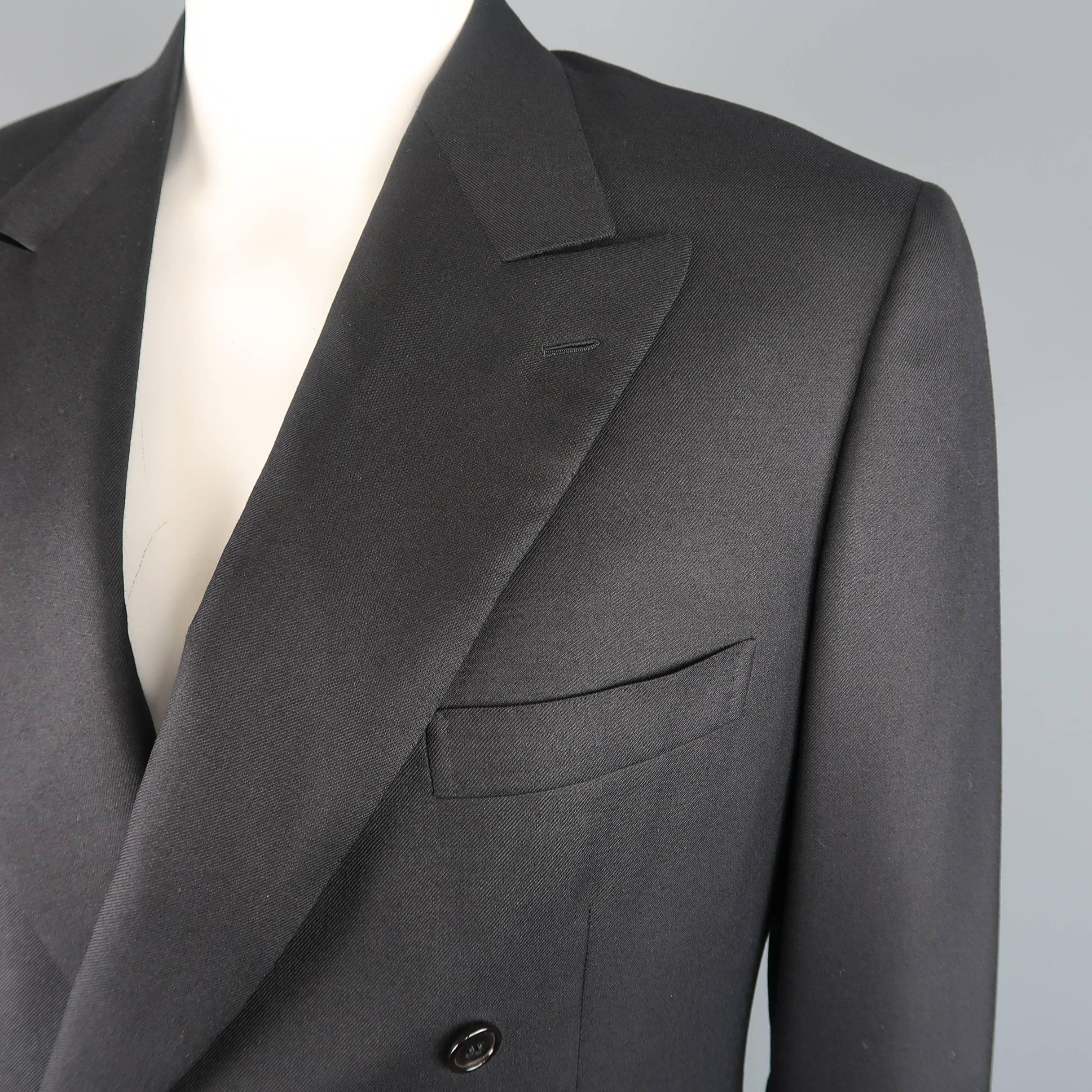 
Double breasted BRIONI for WILKES BASHFORD sport coat comes in wool silk blend twill with a peak lapel, two button closure, and triple flap pockets. Made in Italy.
 
Excellent Pre-Owned Condition.
Marked: 41