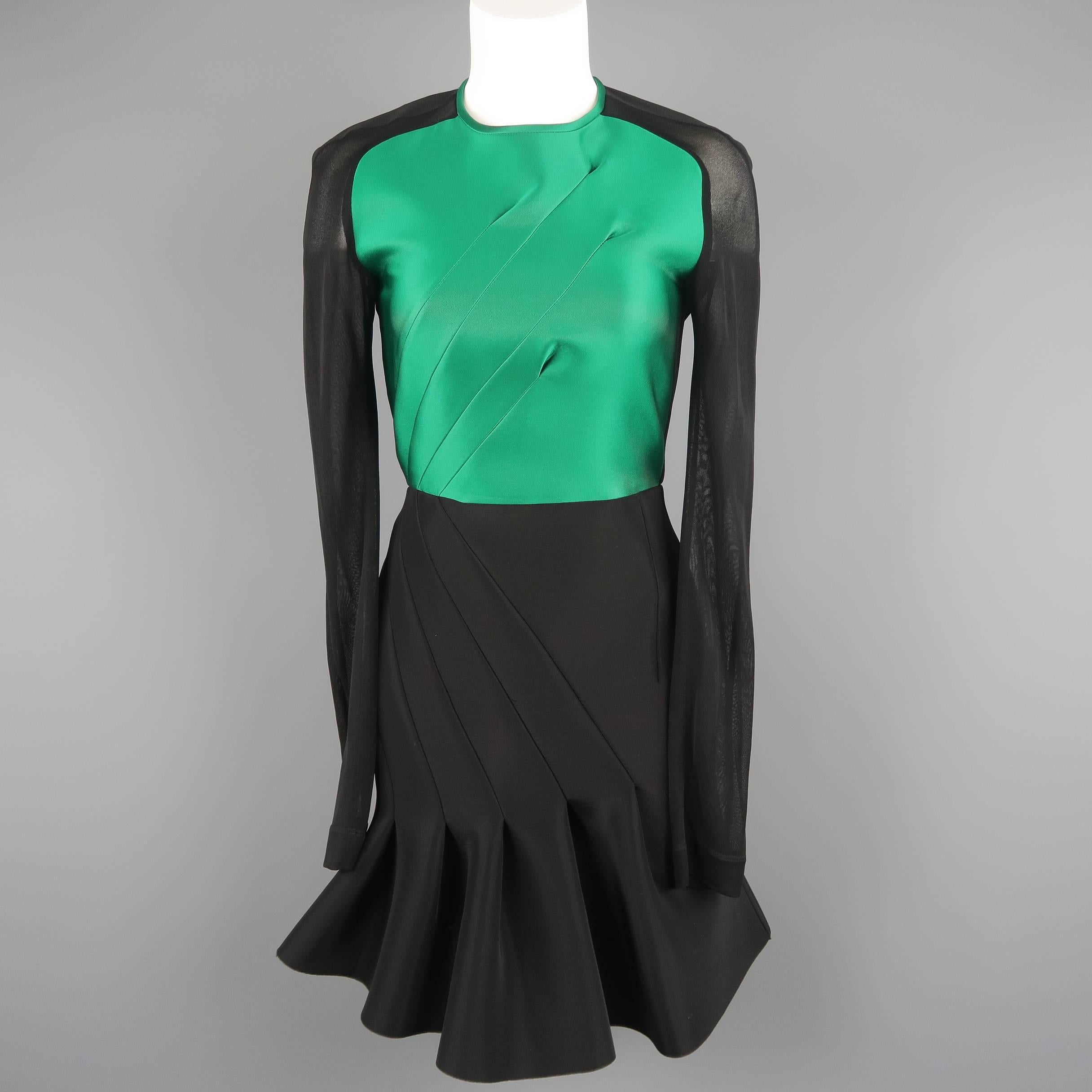 ANTONIO BERARDI dress comes in black scuba neoprene material with a green pleated top panel, sheer mesh sleeves, and a pleated ruffle hem pencil skirt. Made in Italy.
 
Excellent Pre-Owned Condition.
Marked: (no size)
 
Measurements:
Shoulder: 16