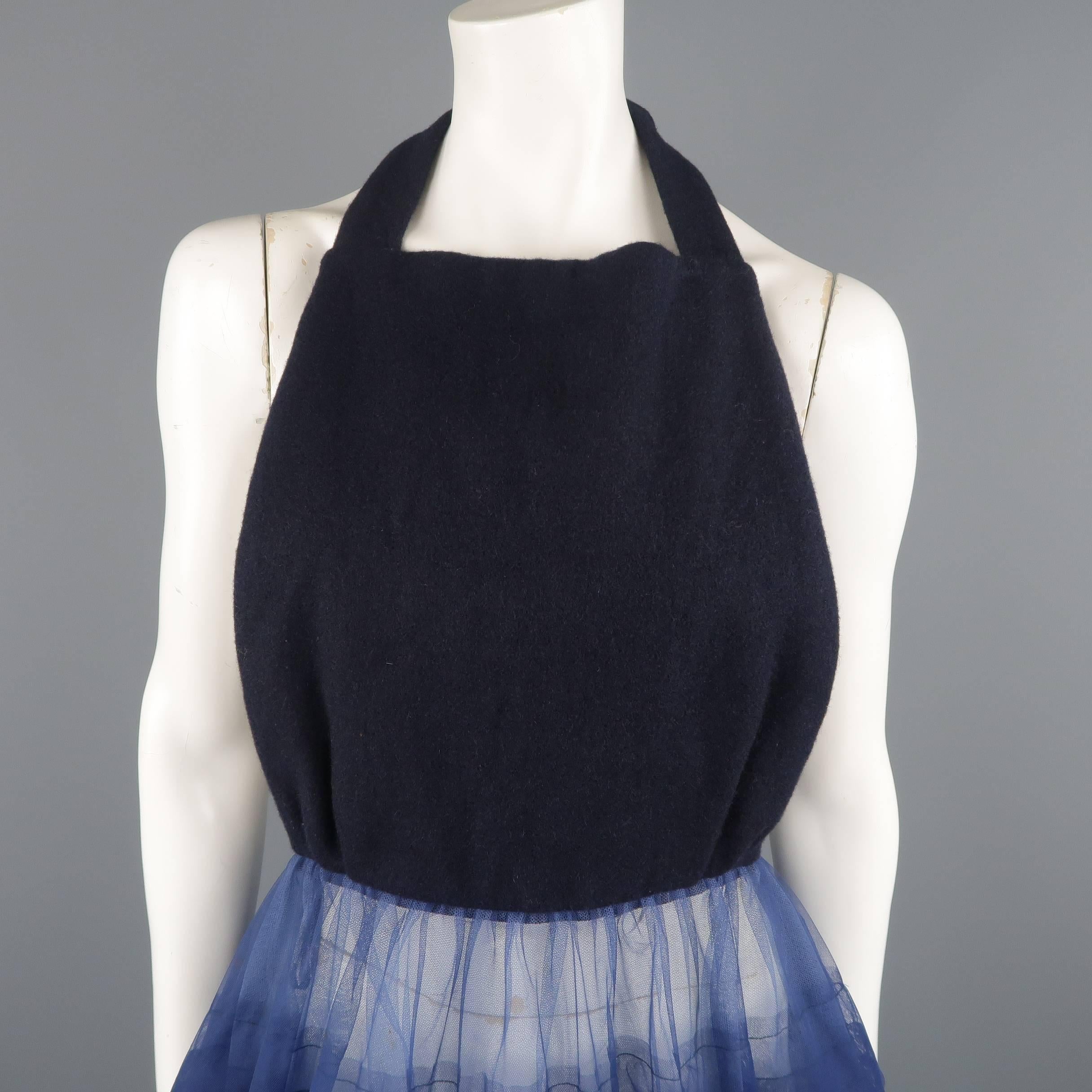 Comme Des Garcons dress features a navy blue felt pleated front panel top with halter tied back and a sheer blue pleated layer tulle circle skirt. Wear and stains throughout. Tags removed. As is.
 
Fair Pre-Owned Condition.
Marked: (no size)
