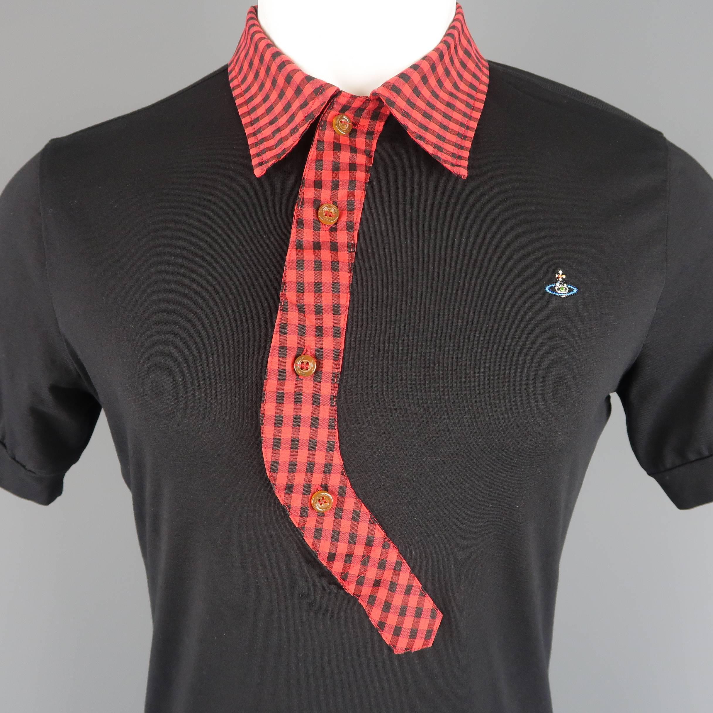 
VIVIENNE WESTWOOD MAN polo comes in black jersey with a red and black gingham plaid collar with asymmetrical buttoned closure and orb emblem.
 
Good Pre-Owned Condition.
Marked: M
 
Measurements:
 

    Shoulder: 17 in.
    Chest: 40 in.
   