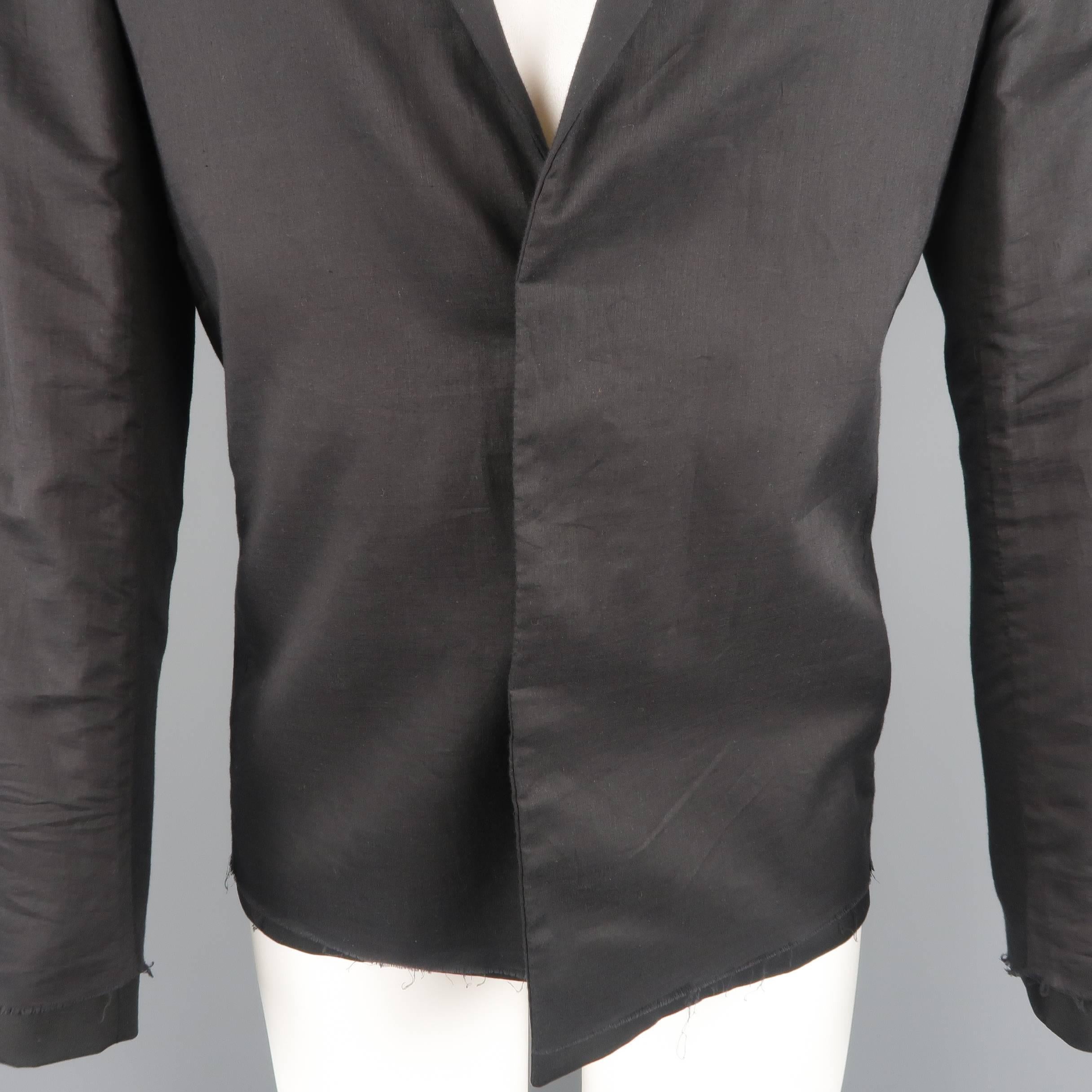 KRIS VAN ASSCHE sport coat comes in black wool with a raw frayed edge gauze overlay, two button front, and notch lapel. Made in Italy.
 
New with Tags.
Marked: IT 46
 
Measurements:
 
Shoulder: 17 in.
Chest: 40 in,
Sleeve: 26 in.
Length: 30 in.