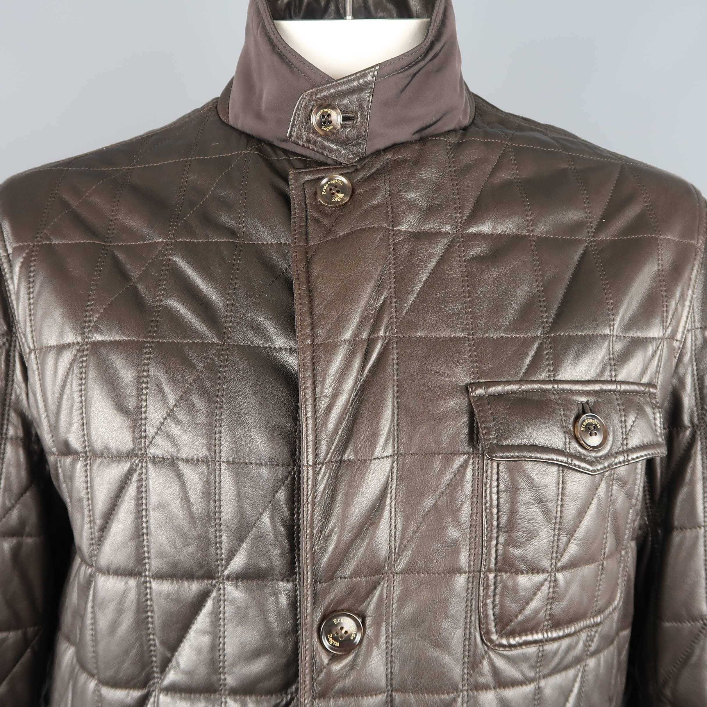 ERMENEGILDO ZEGNA jacket comes in rich chocolate brown supple quilted leather with a high buttoned collar, buttoned placket zip front, and patch flap pockets.  Made in Italy.
 
Excellent Pre-Owned Condition.
Marked: IT 56
 
Measurements:
 
Shoulder:
