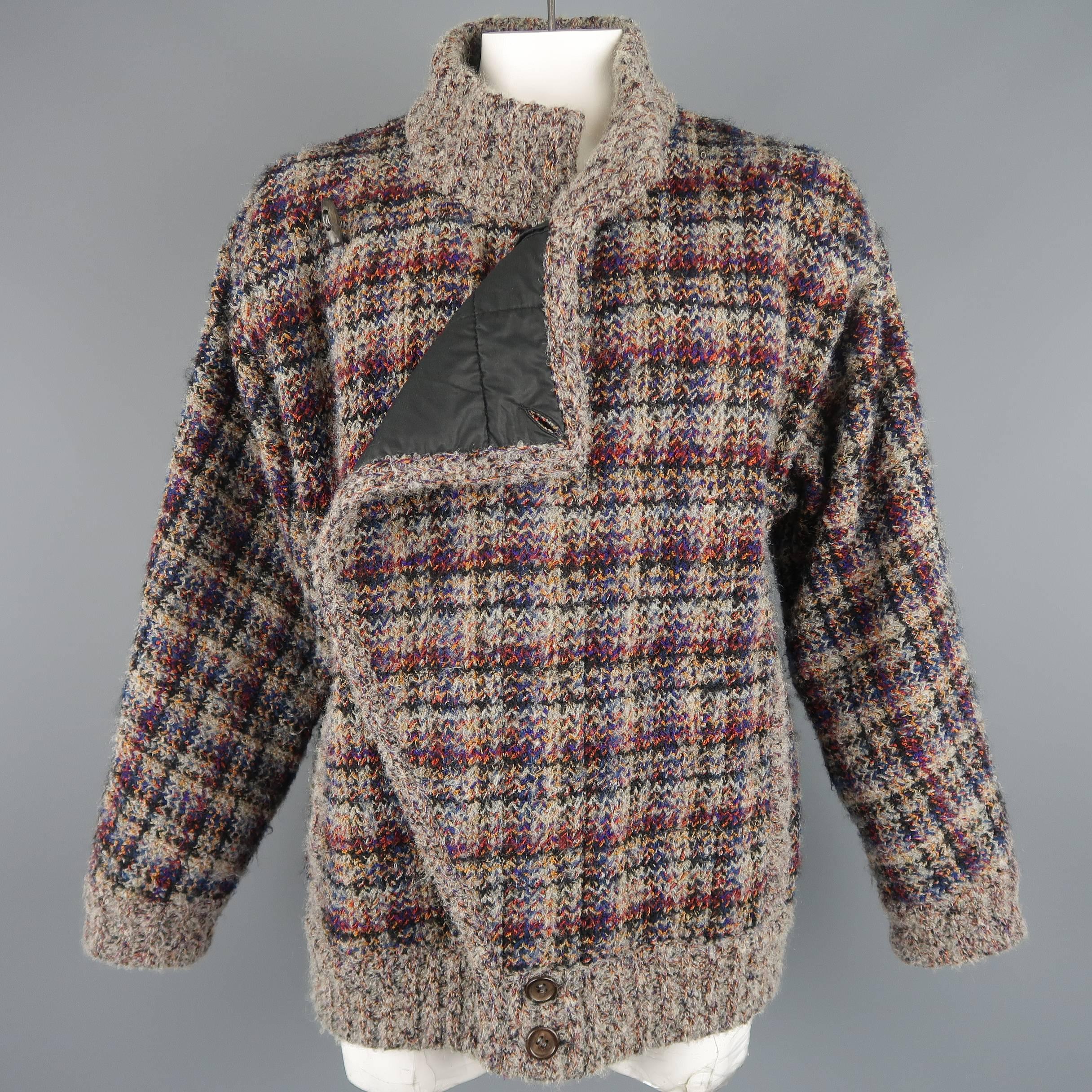 Vintage MISSONI jacket comes in neutral gray and multi-color plaid textured wool knit material with a high collar, double breasted closure, and can be worn reversible. No tag. As-is. Made in Italy.
 
Good Pre-Owned Condition.
Marked: (no size)
