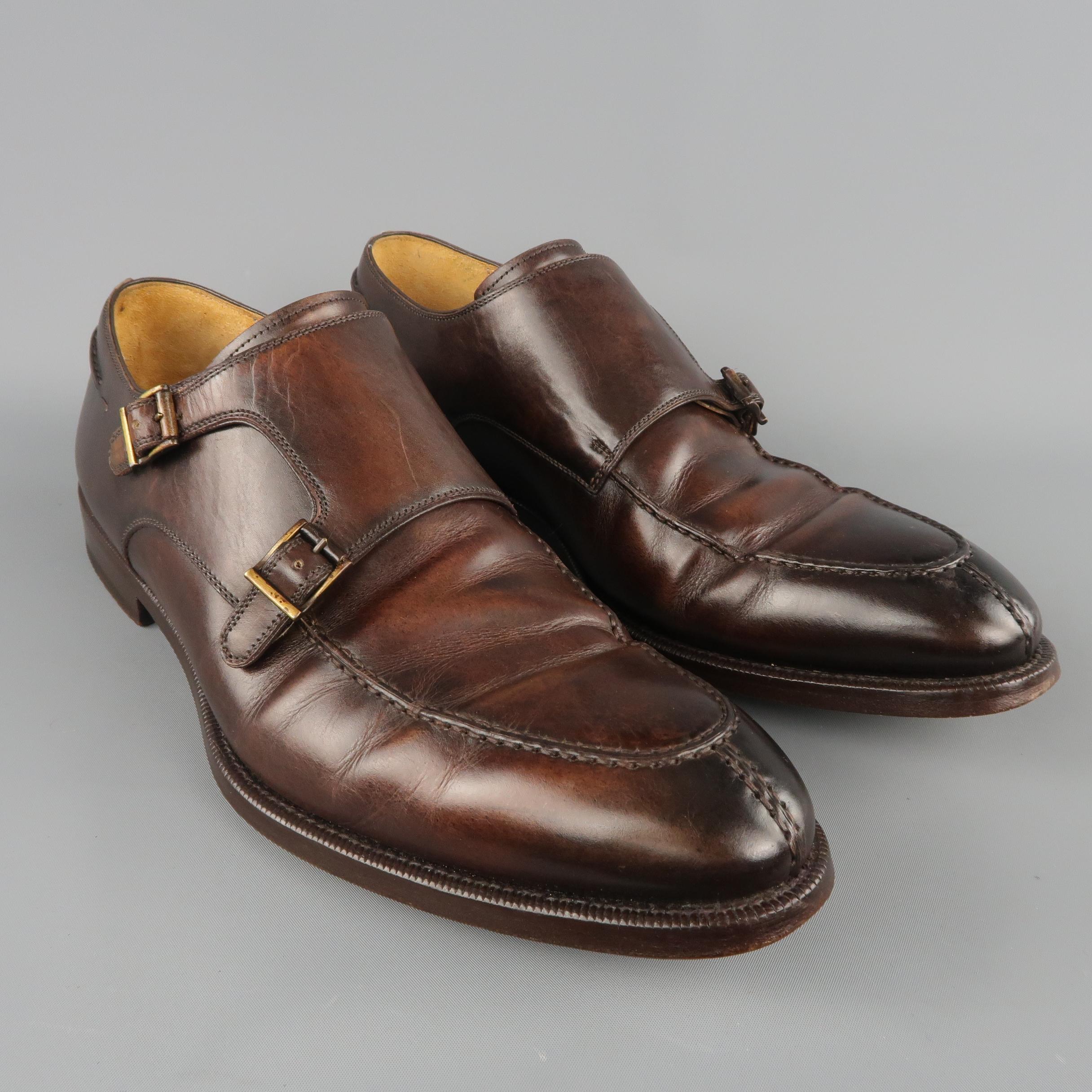 MAGNANNI dress shoes come in brown antiqued leather with a pointed apron split toe and double monk strap. Made in Spain.
 
Good Pre-Owned Condition.
Marked: UK 11 M
 
Outsole: 12.5 x 4.5 in.