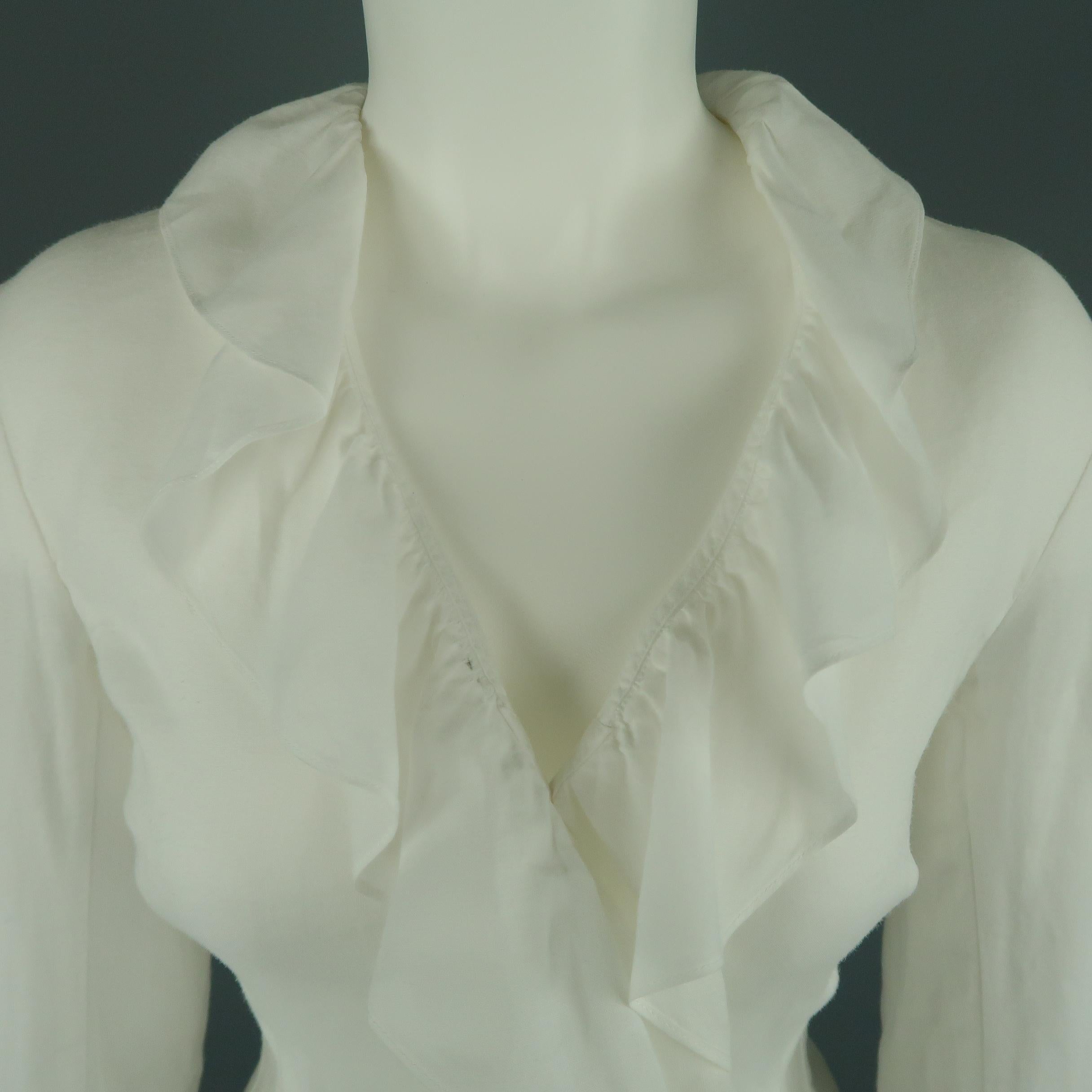 RALPH LAUREN BLACK LABEL blouse comes in white sheer ramie and features a V neck, three quarter sleeves, and ruffled collar and hem. Stain on neckline. As-is.
 
Fair Pre-Owned Condition.
Marked: 6
 
Measurements:
 
Shoulder: 16 in.
Bust: 36