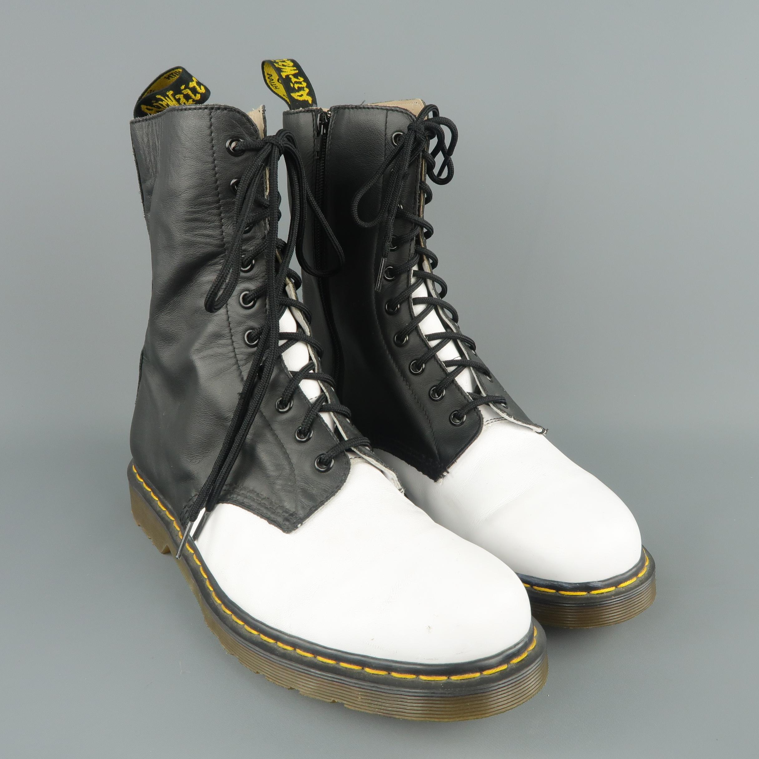Limited Edition Yohji Yamamoto For Dr. Martens combat boots feature a white leather toe with black leather shaft, lace up front, and side zip. Wear throughout. As is.
 
Fair Pre-Owned Condition.
Marked: US 11
 
Measurements:
 
Outsole: 12.5  x 4.5