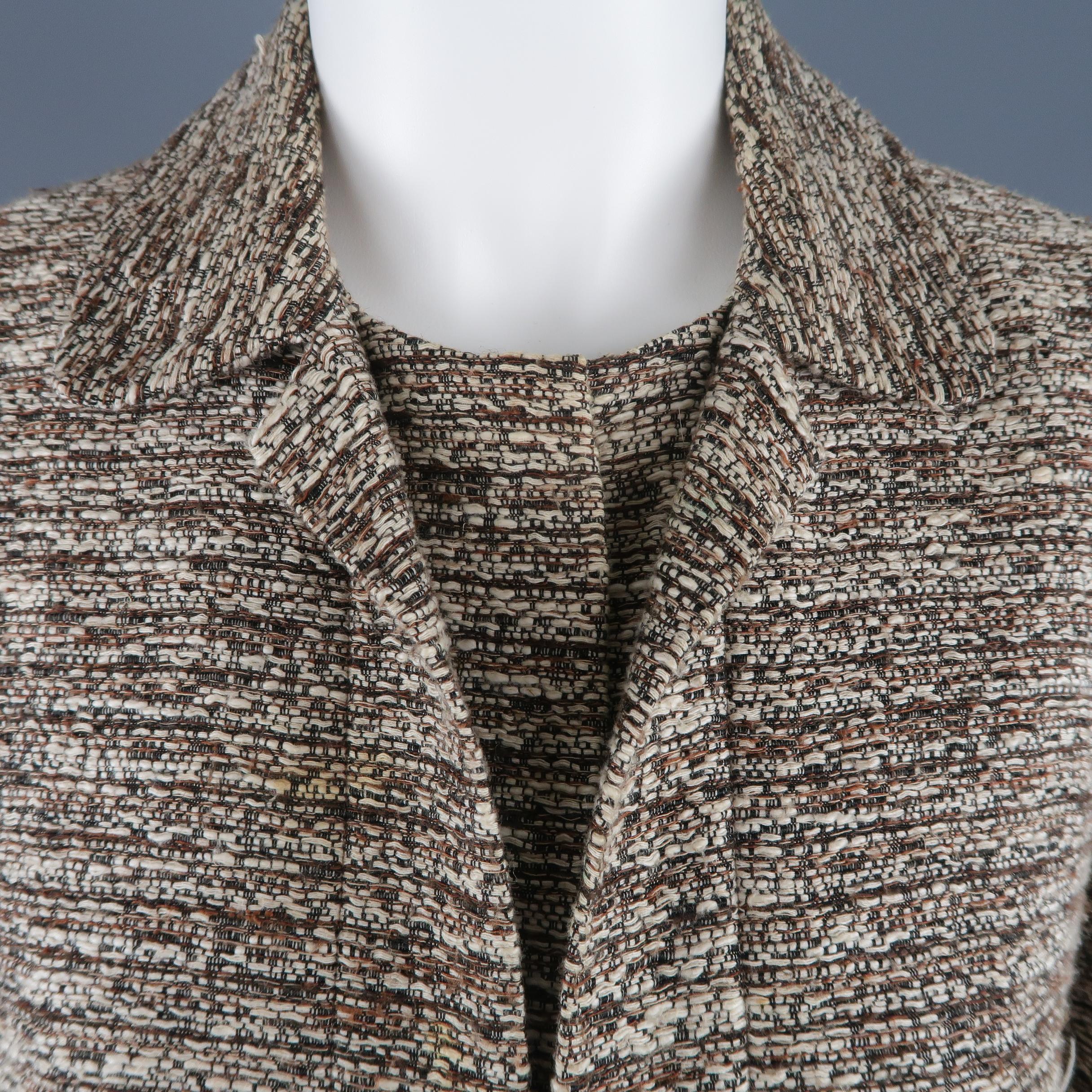 CHLOE jacket comes in cotton linen silk blend tweed with a pointed collar, faux flap pockets, and layered hidden snap closure. Stains on front. As -is. Made in France.
 
Fair Pre-Owned Condition.
Marked: 42
 
Measurements:
 
Shoulder: 15 in.
Bust: