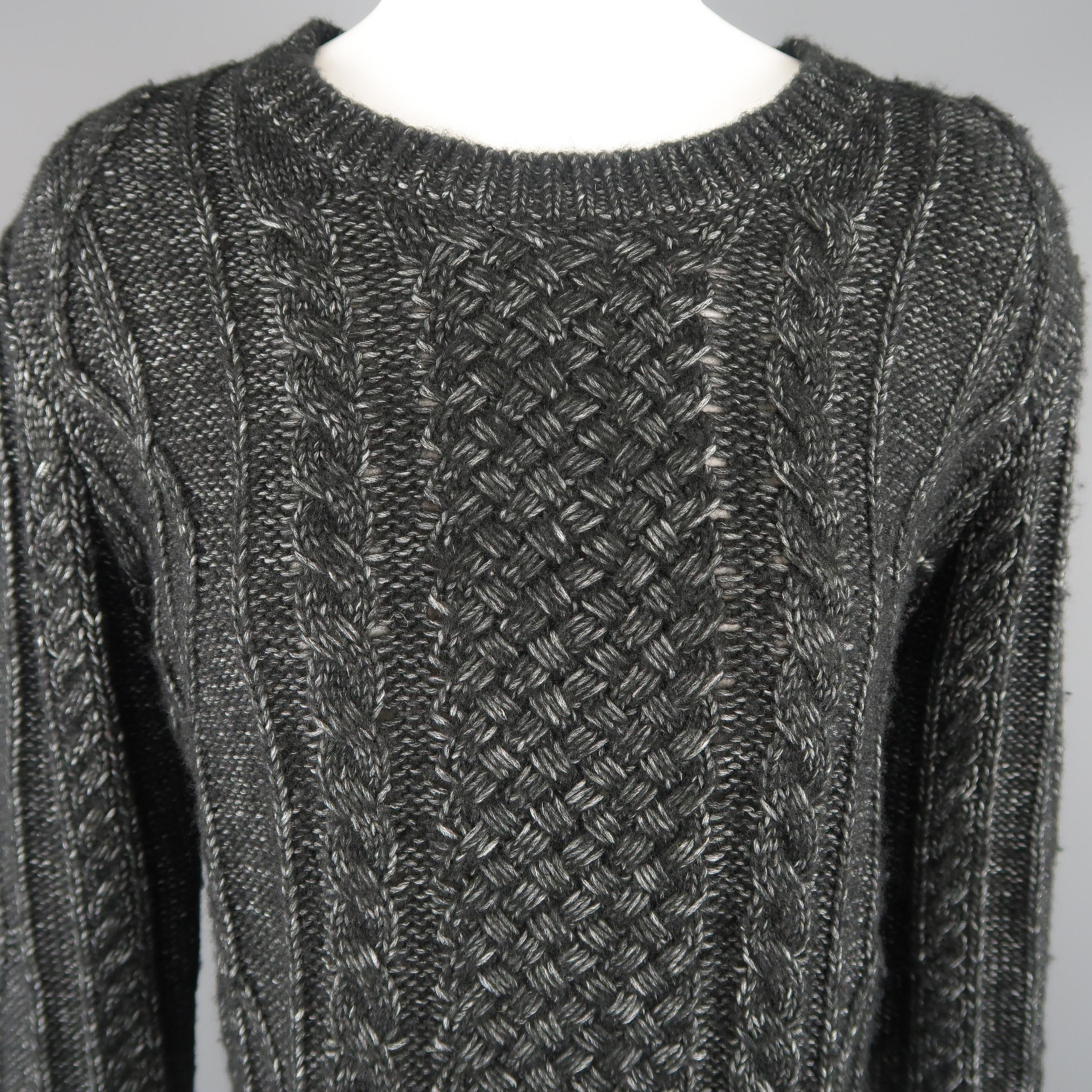 DEREK LAM pullover sweater comes in charcoal heathered cable knit with a crewneck and slit sides.
 
New with Tags.
Marked: M
 
Measurements:
 
Shoulder: 18 in.
Bust: 42 in.
Sleeve: 25 in.
Length: 24 in.
