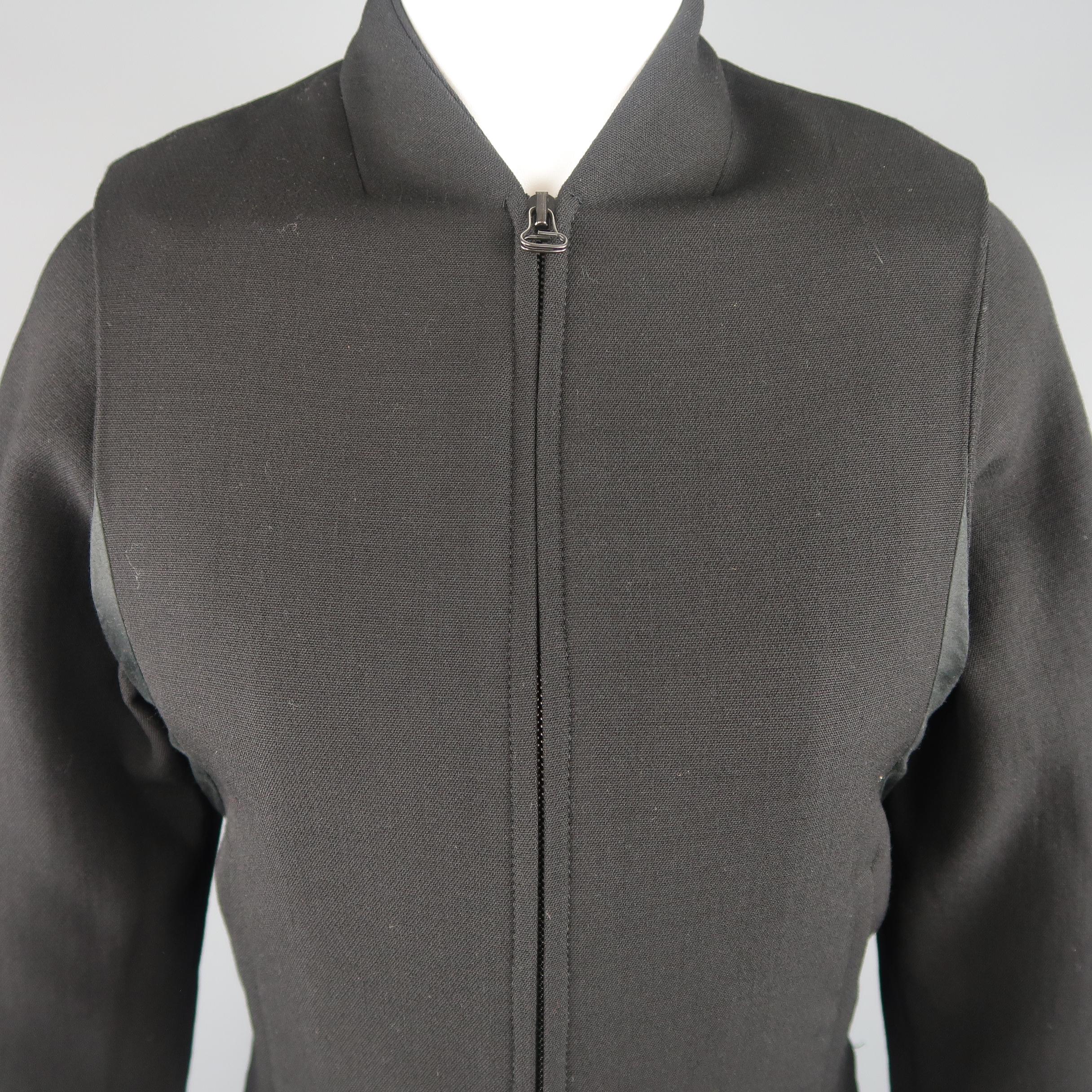 HELMUT LANG baseball jacket comes in black wool blend fabric with a simulated baseball collar, zip front, slit pockets, and vest overlay panel.
 
Excellent Pre-Owned Condition.
Marked: P
 
Measurements:
 
Shoulder: 14 in.
Bust: 33 in.
Sleeve: 25