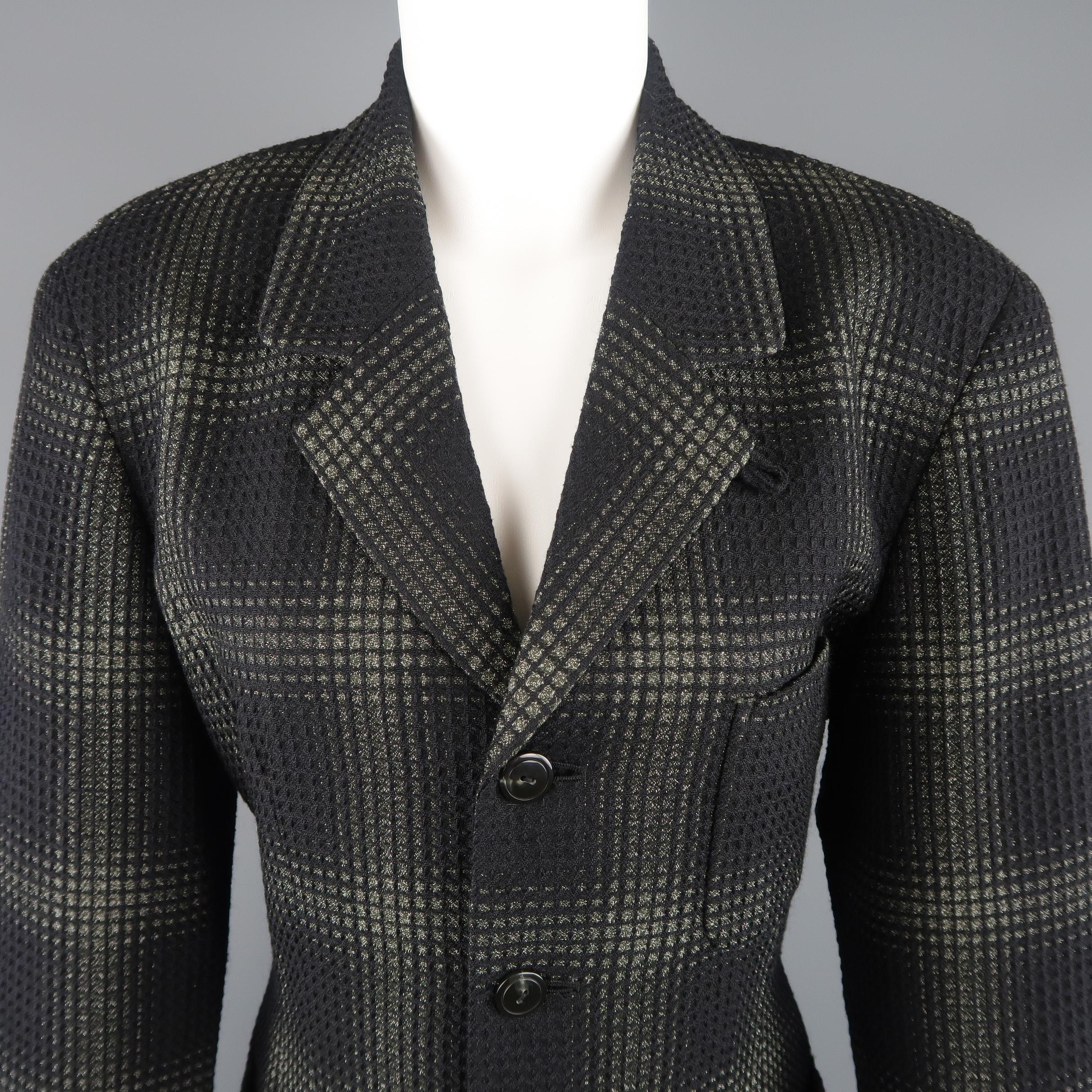 Vintage MATSUDA sport coat jacket comes in black textured wool silk blend fabric with an all over moss green plaid pattern, four button front, pointed lapel, and patch pockets. Made in Japan.
 
Good Pre-Owned Condition.
Marked:(no size)
