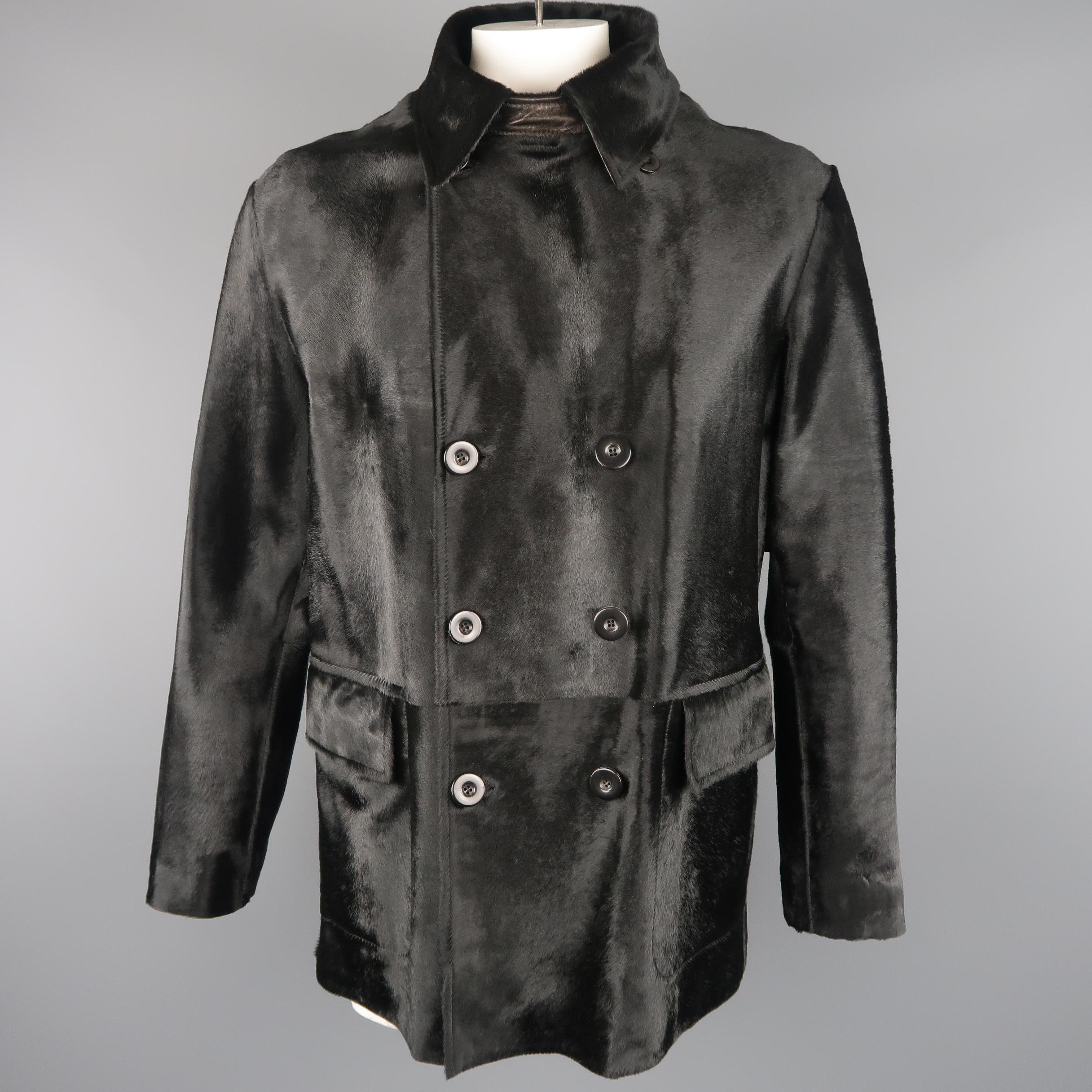 ARMANI COLLEZIONI LUXURY line jacket comes in black ponyhair leather with a pointed collar, double breasted button up front, and large lap pockets.
 
Excellent Pre-Owned Condition.
Marked: IT 56
 
Measurements:
 
Shoulder: 21 in.
Chest: 46