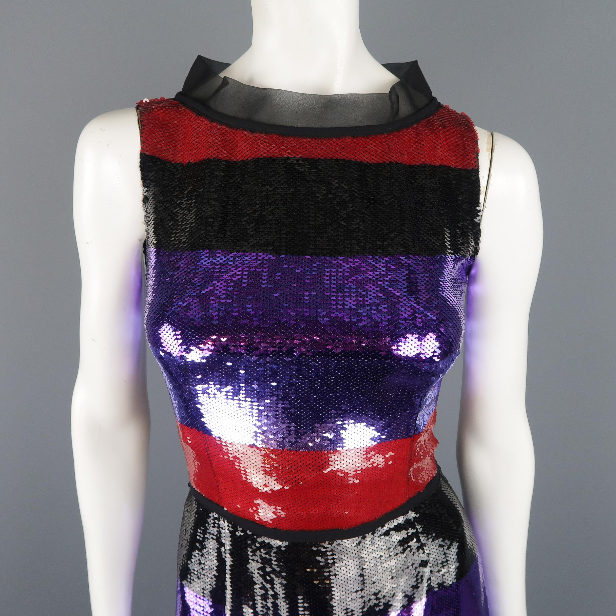 This gorgeous Prada column gown comes in red, purple, black, and lavender striped pattern sequin material with a chiffon stand up neckline, fitted bodice, and long skirt. Worn once. Tag cut. Made in Italy.
 
Excellent Pre-Owned Condition.
Marked: IT