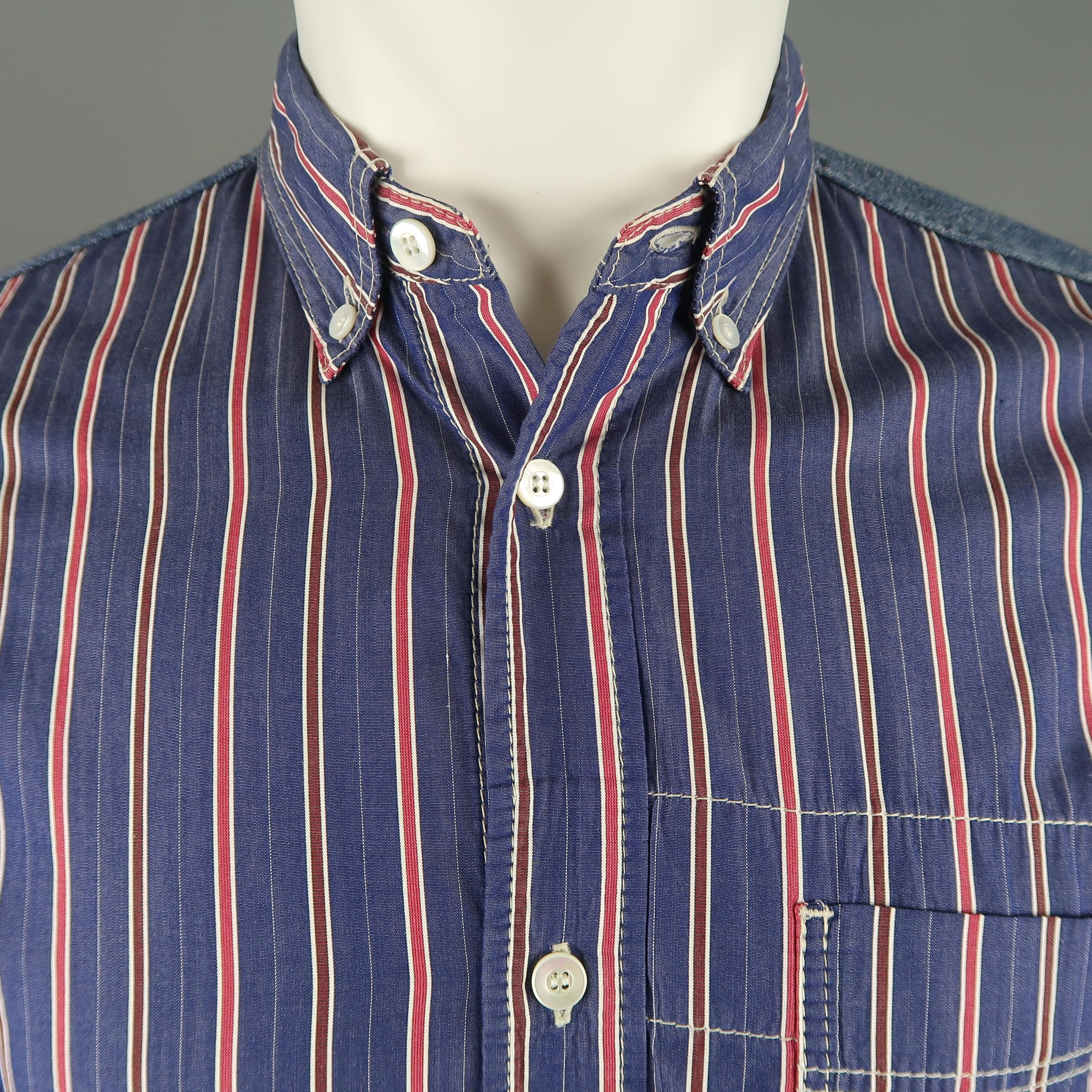 Junya Watanabe shirt comes in navy and red striped cotton with a button down collar, patch breast pocket, thick knit piping along the hem, and denim panels. Made in Japan.
 
Good Pre-Owned Condition.
Marked: S (AD 2012)
 
Measurements:
 
Shoulder: