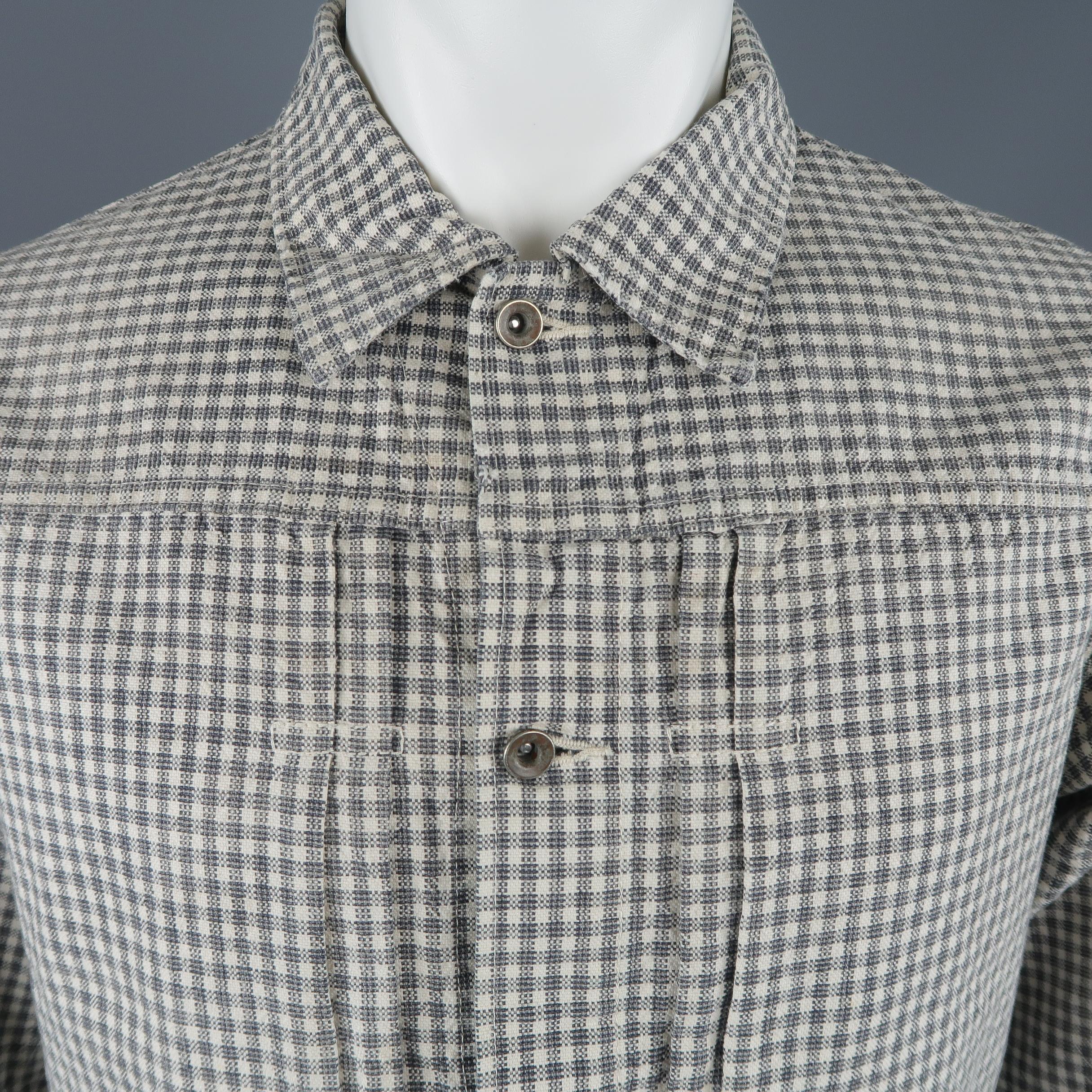 CHIMALA trucker style jacket comes in cream and gray checkered plaid pattern textured canvas with a pointed collar, pleated front detail, and distressing throughout. Discoloration on sleeve. As-is. Made in Japan.
 
Good Pre-Owned Condition.
Marked: