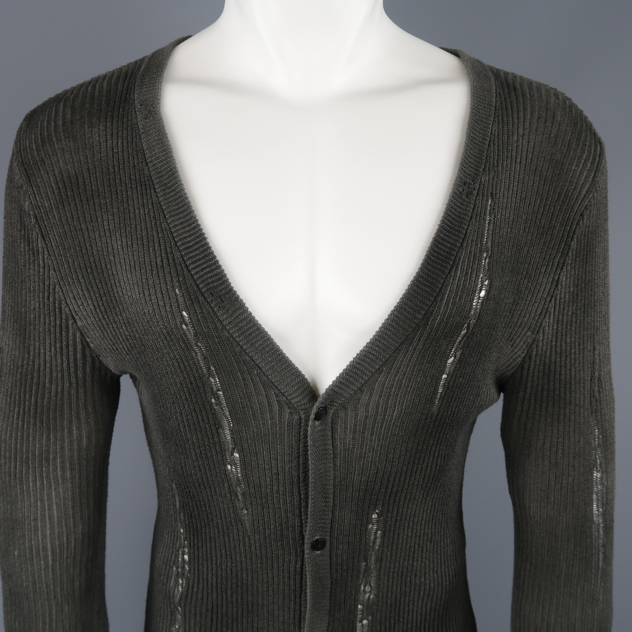 SKINGRAFT biker vest comes in gray washed denim with a pointed lapel collar, asymmetrical closure, quilted shoulders, and flap pockets with silver tone buttons.
 
Good Pre-Owned Condition.
Marked: S
 
Measurements:
 
Shoulder: 18 in.
Chest: 42