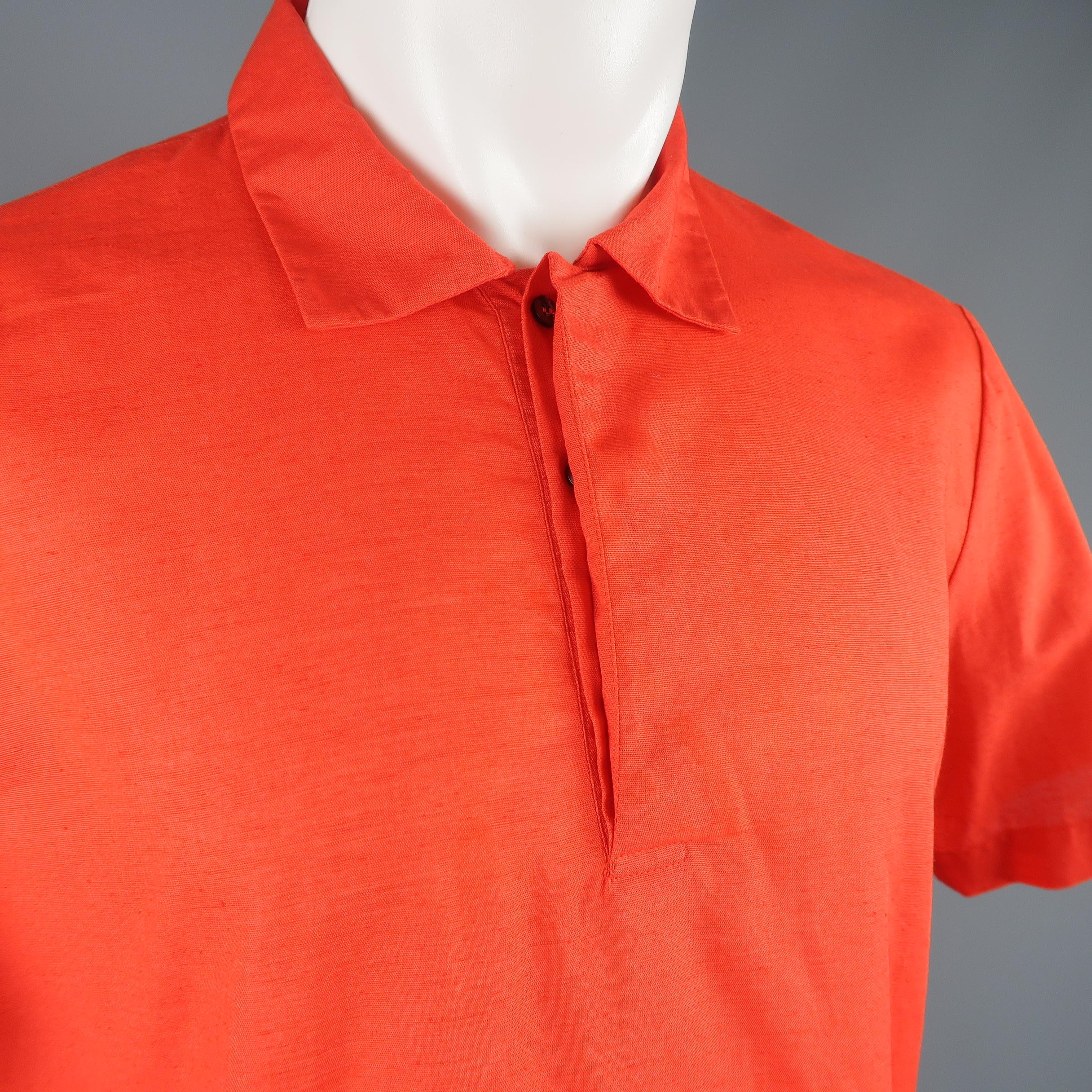 MSGM shirt comes in bright red cotton linen blend fabric with a pointed collar, short sleeves, and half button polo style closure with placket. Made in Italy.
 
Excellent Pre-Owned Condition.
Marked: IT 50
 
Measurements:
 
Shoulder: 18 in.
Chest: