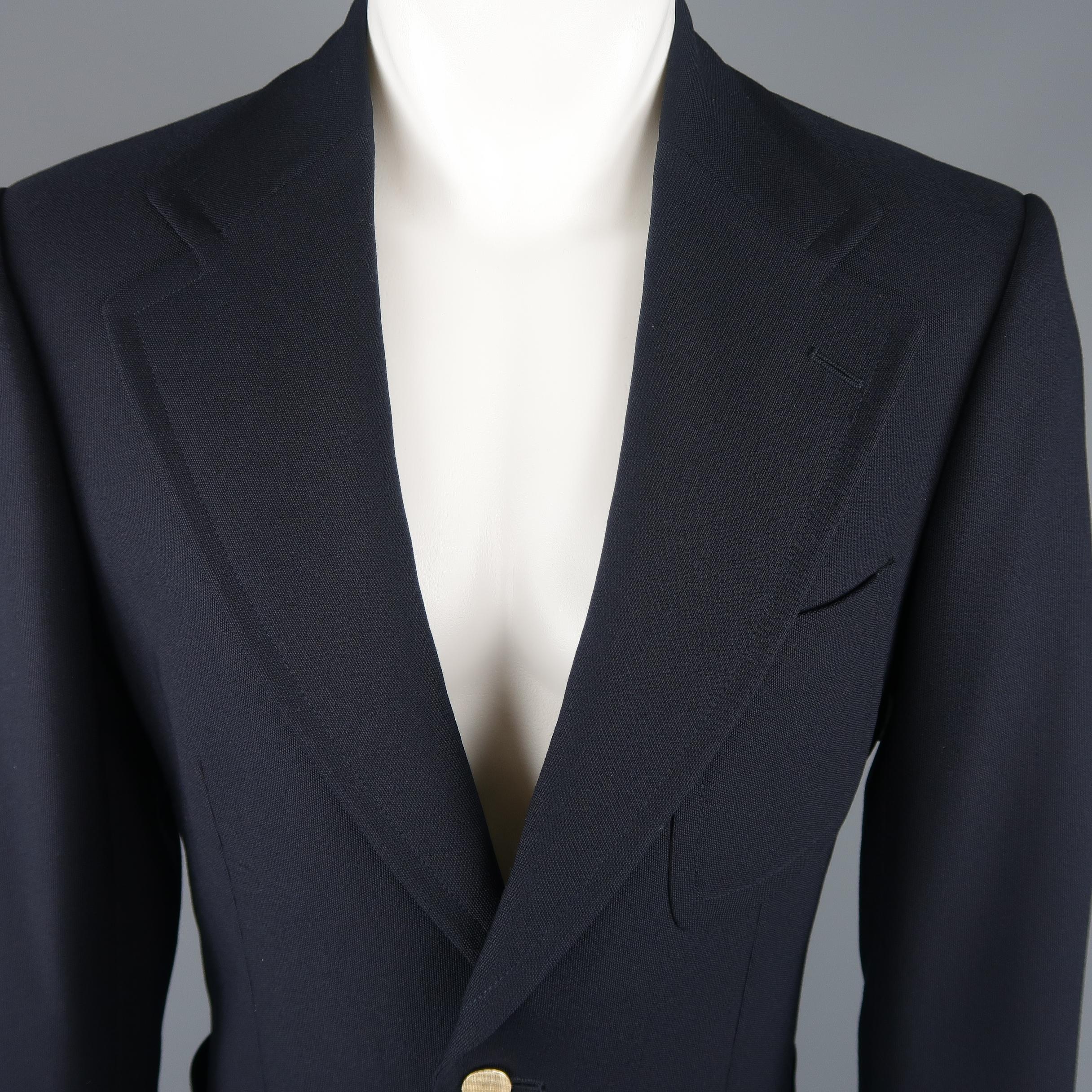 Archive GUCCI by TOM FORD single breasted sort coat comes in navy wool canvas with a wide notch lapel, patch pockets, and metal buttons. Made in Italy.
 
Excellent Pre-Owned Condition.
Marked: IT 48
 
Measurements:
 

    Shoulder: 18 in.
    Chest: