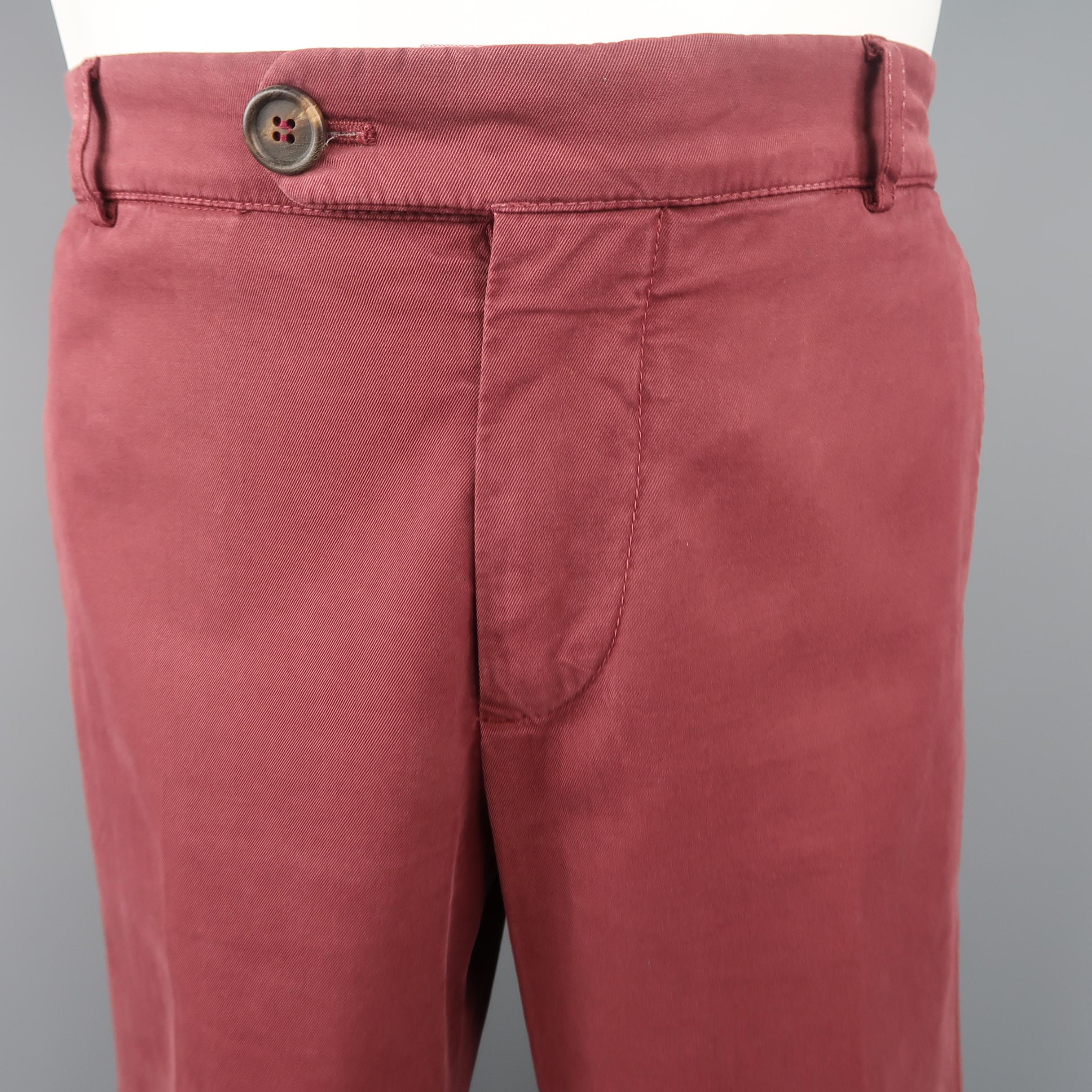 BRUNELLO CUCINELLI chinos come in a washed burgundy cotton twill with welt pockets, and a tab closure waistband. Made in Italy.
 
Excellent Pre-Owned Condition.
Marked: IT 50
 
Measurements:
 
Waist: 34 in.
Rise: 9.5 in.
Inseam:  34 in.