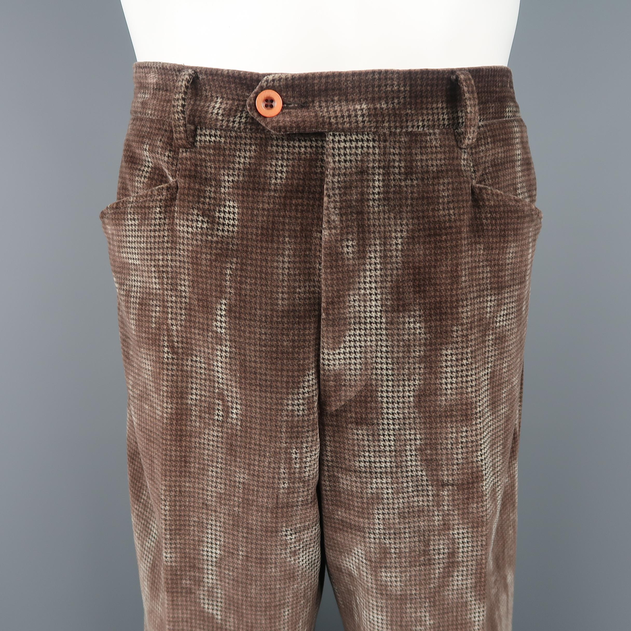 ETRO dress pants come in black and white houndstooth velvet with all taupe brown over bleach splatter marble effect print with a relaxed leg and tab closure. Made in Italy.
 
Good Pre-Owned Condition.
Marked: IT 48
 
Measurements:
 
Waist: 32