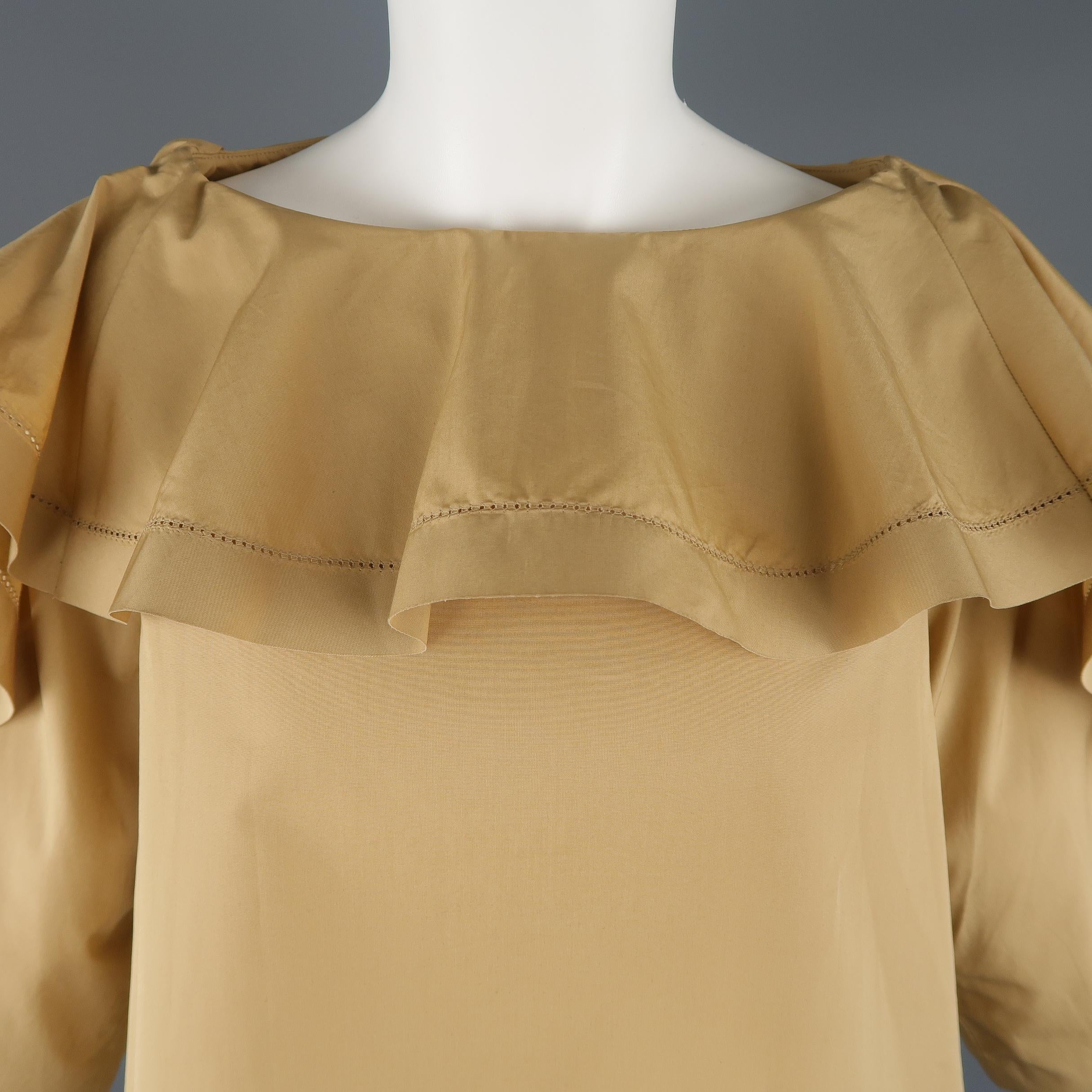 CHLOE blouse comes in a tan beige cotton poplin with a boat neck line, A line silhouette, and wide cropped sleeves with cascading ruffles from the collar down the shoulder.
 
Good Pre-Owned Condition.
Marked: FR 34
 
Measurements:
 
Shoulder: 13